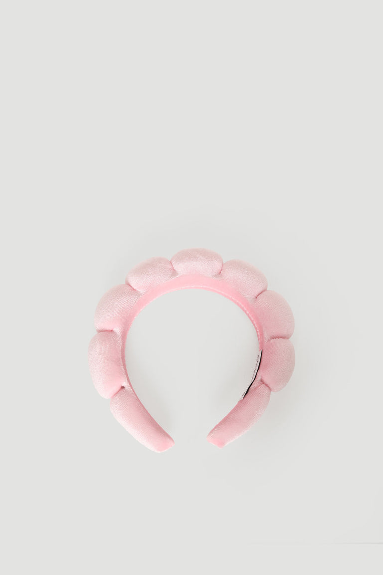 Soft pink padded headband for girls featuring a plush, bubble-like design for a playful, cozy look.