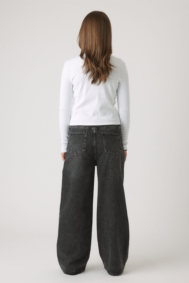 Girls Dad Baggy Jean in dark washed black denim with a loose wide-leg fit by DECJUBA Australian fashion brand