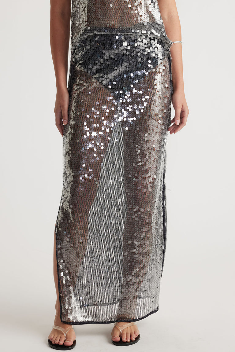 Model wearing Savannah Sequin Skirt in portrait with side splits and elasticated waistband, gallery position 2 shot