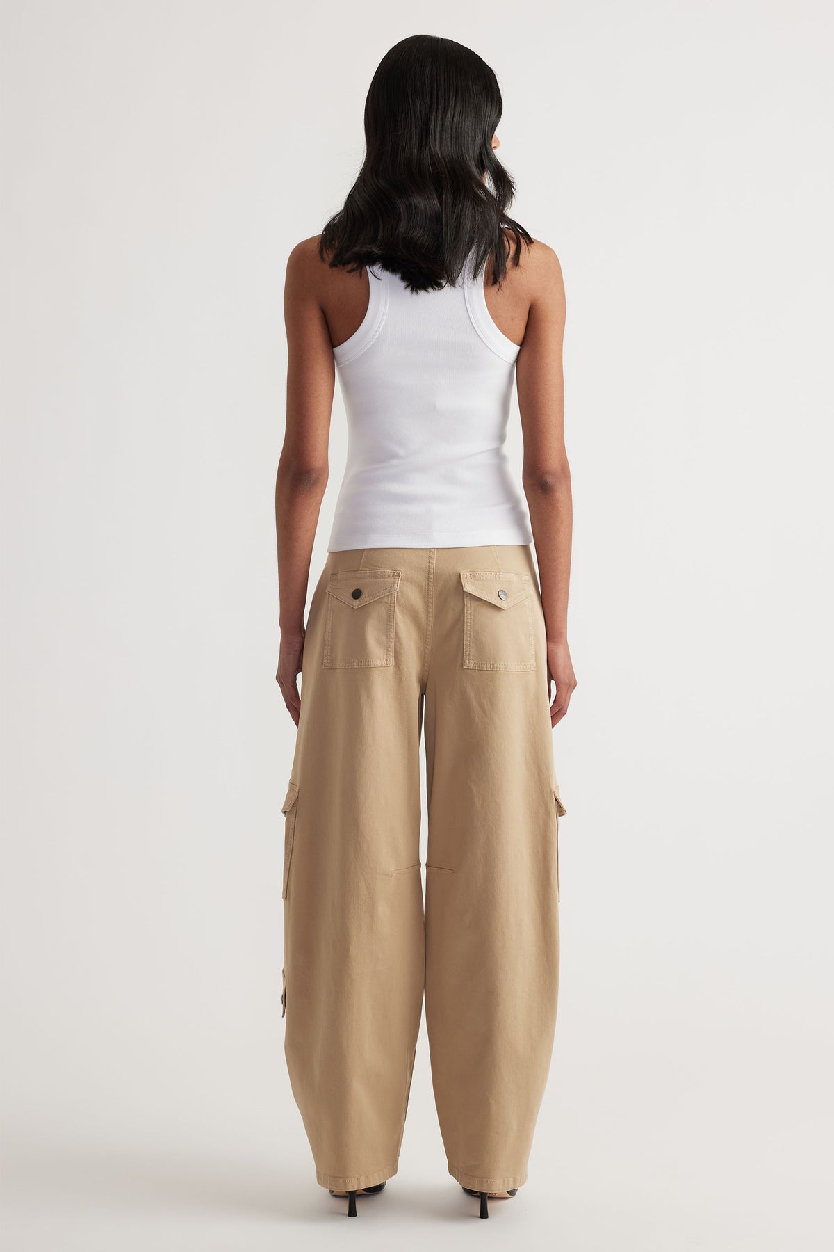 Charlotte Rib Tank in white with a sleek fit, paired with wide-leg beige cargo pants by DECJUBA Australian brand