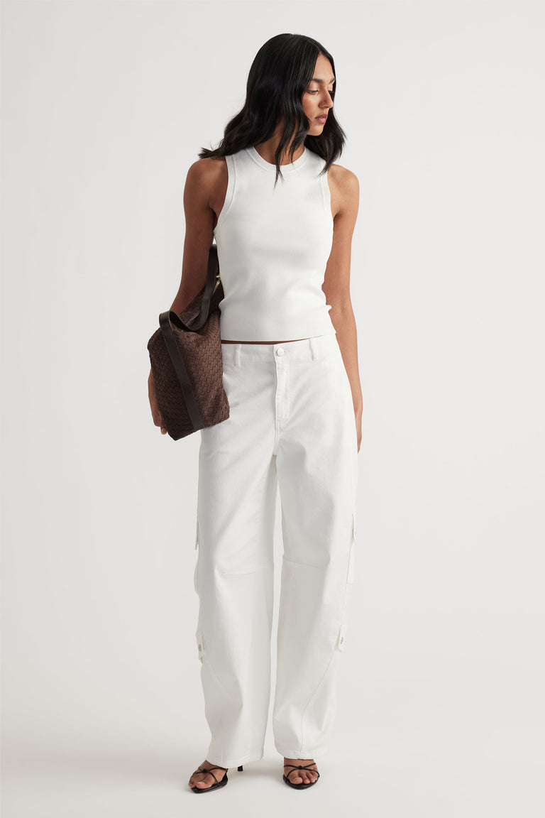Ava Crew Neck Knit Tank in white sleeveless knitwear paired with relaxed white cargo pants by DECJUBA Australian fashion brand