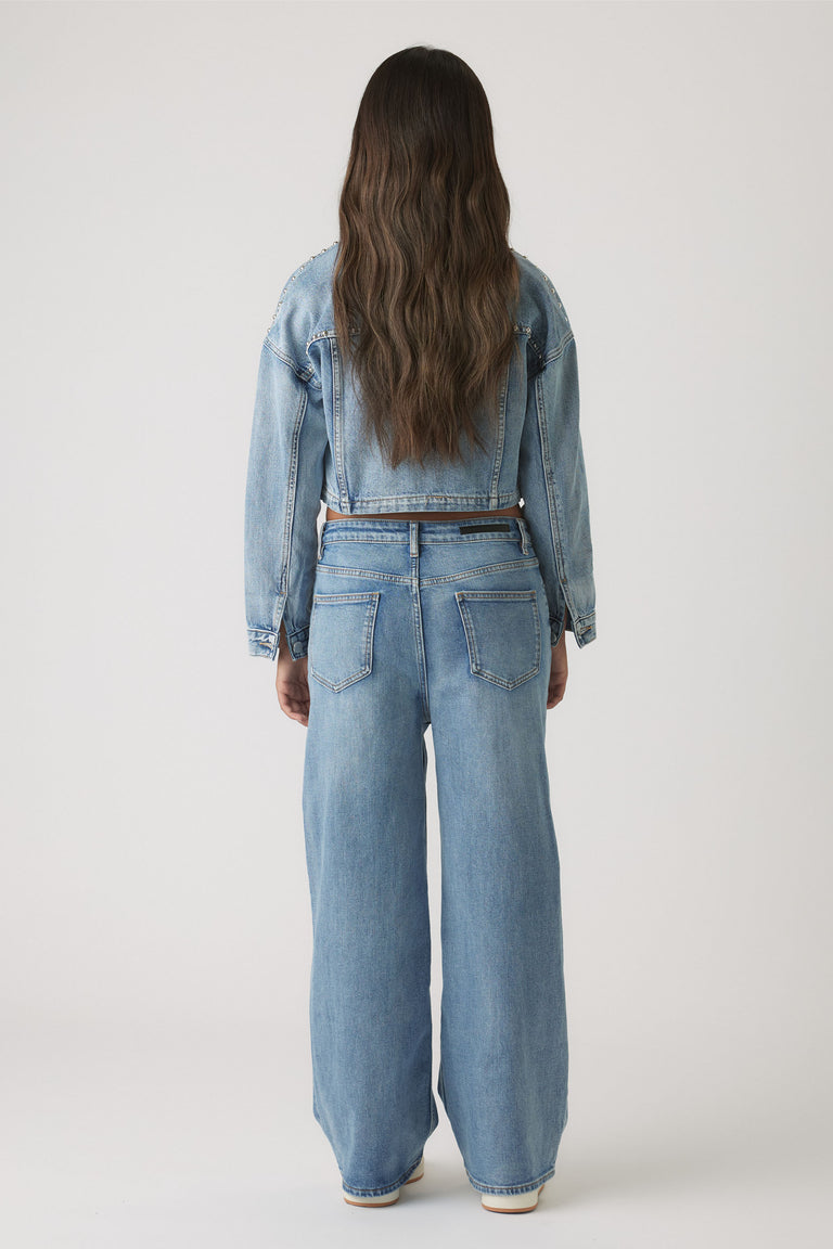 Back view of Girls Hailey Wide Leg Jean in light blue denim with relaxed fit and high waist by Decjuba Australian brand