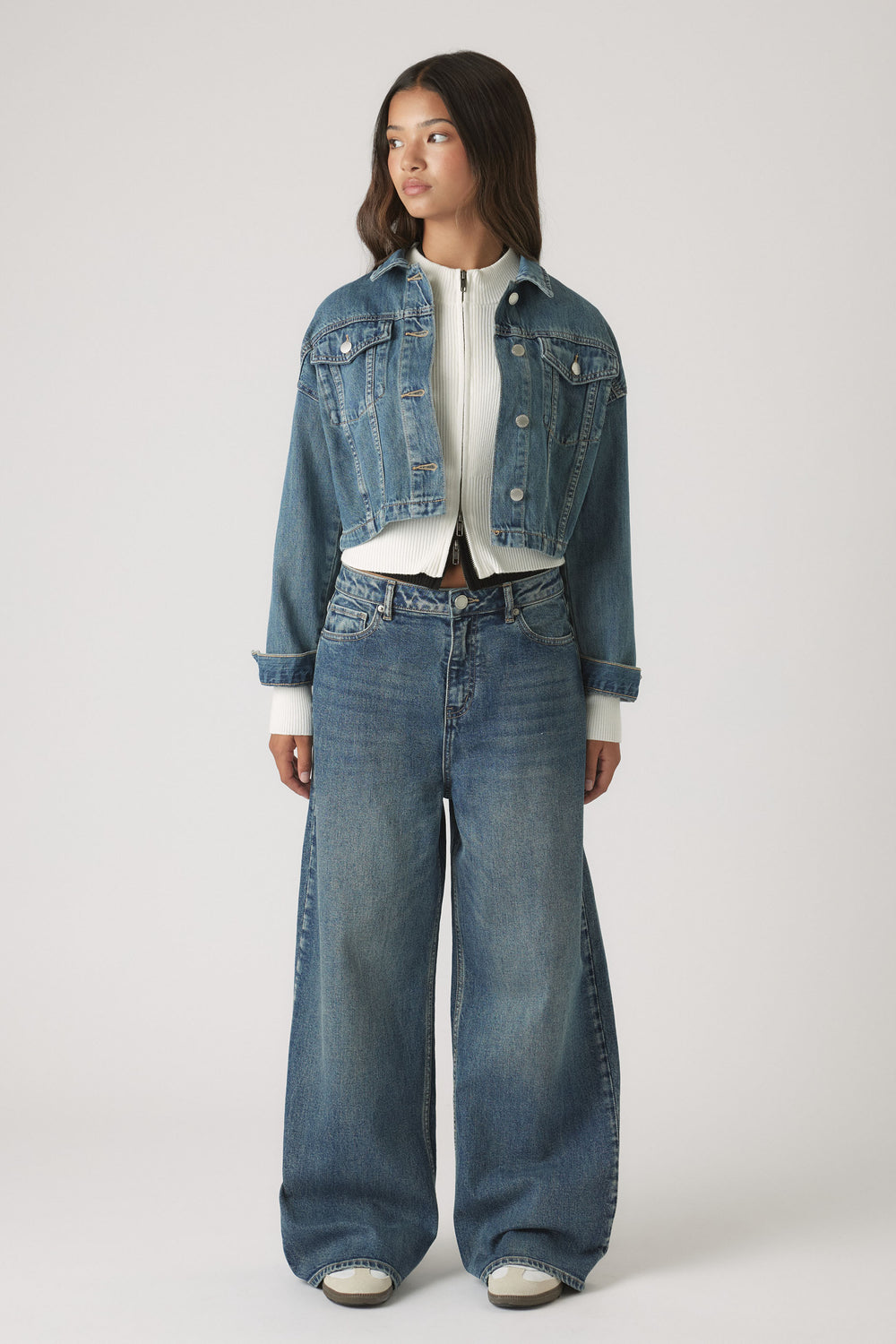 Girls Dad Baggy Jean in loose fit with classic mid-blue denim styled with cropped jacket by DECJUBA Australian fashion brand