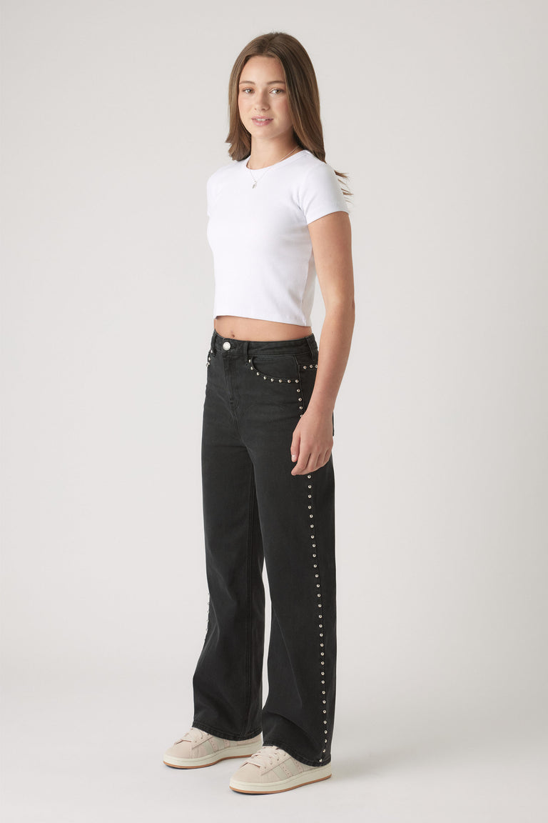 Girls Hailey Studded Jean in black denim featuring silver stud accents along side seams and pockets by DECJUBA Australian fashion brand