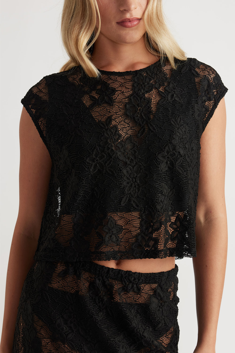 Lace Cropped Top in black floral lace with sheer detail and cap sleeves, designed by DECJUBA Australian fashion brand