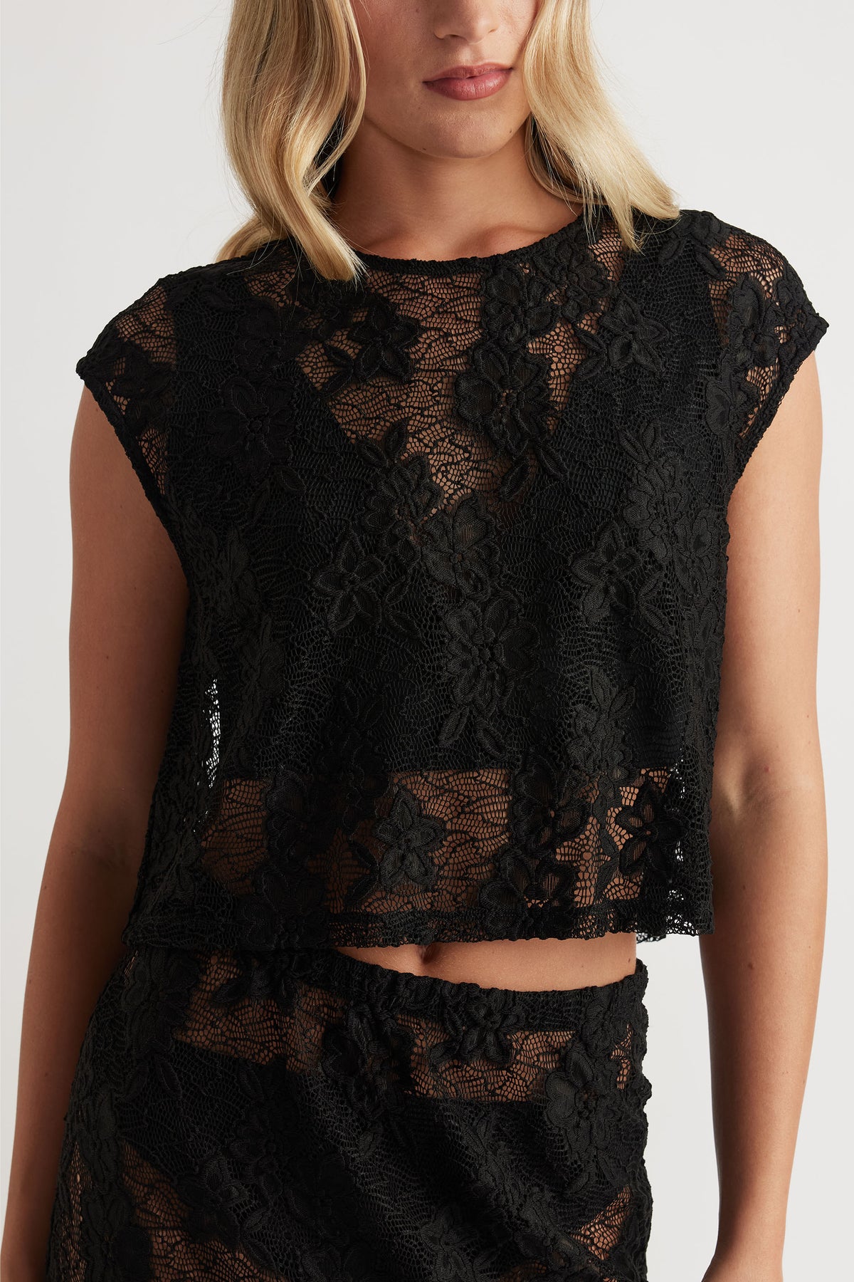 Lace Cropped Top in black floral lace with sheer detail and cap sleeves, designed by DECJUBA Australian fashion brand
