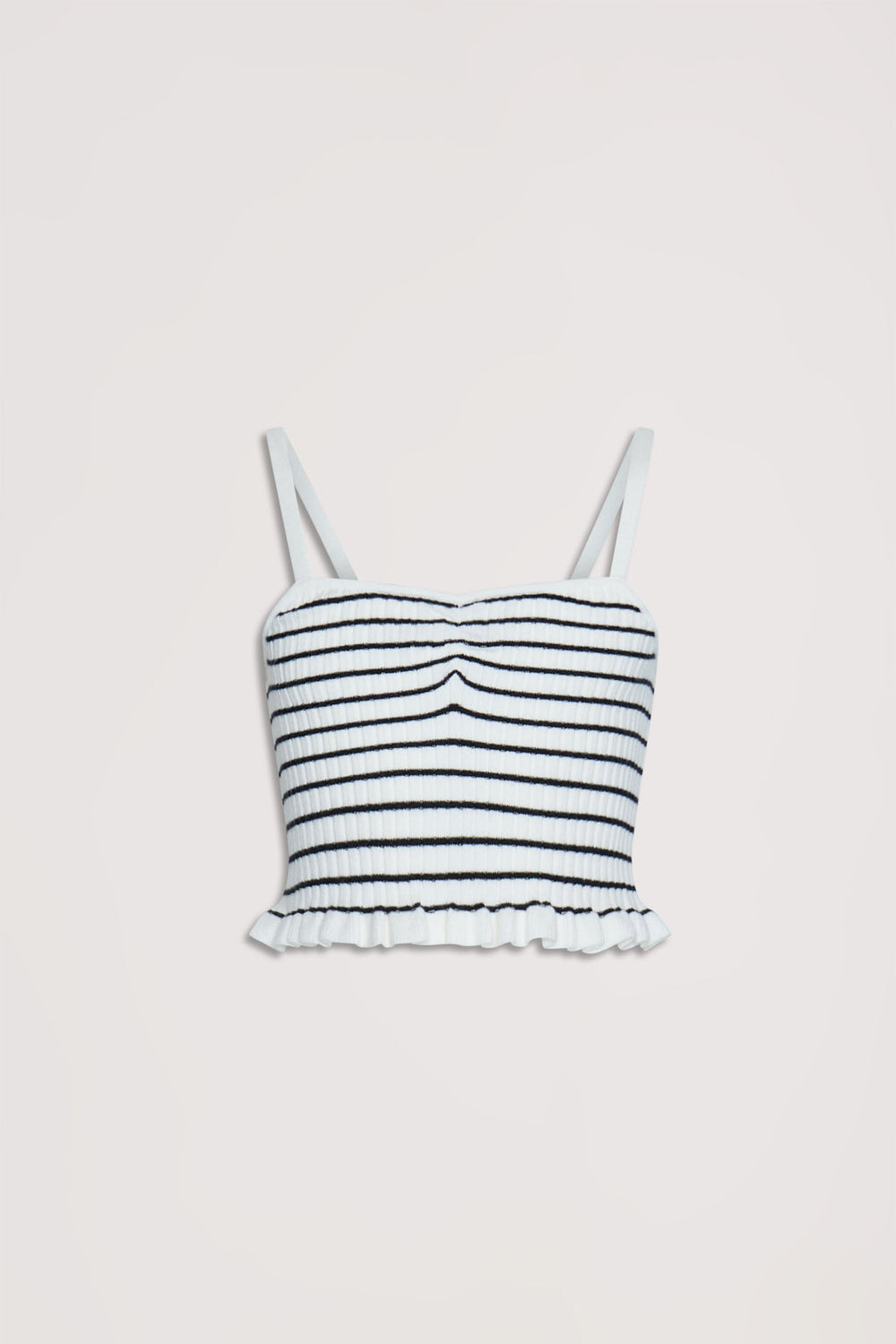 Cropped white tank top with thin straps, textured horizontal stripes, and ruffled hem for a playful, casual look.