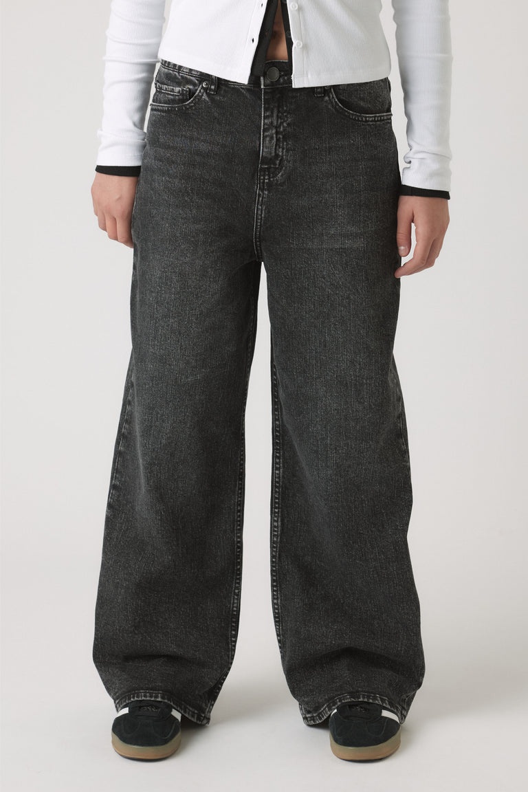Girls Dad Baggy Jean in faded black denim with relaxed wide-leg silhouette by DECJUBA Australian fashion brand