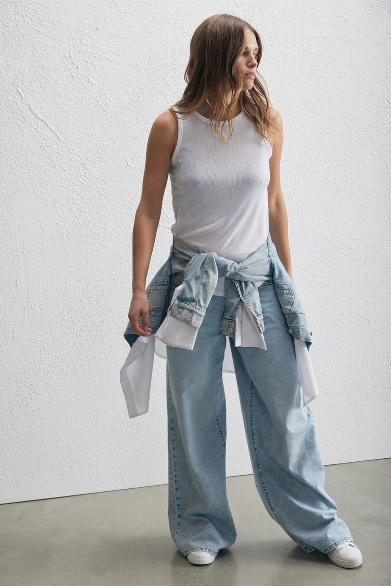 Pollie Soft Rib Tank worn with light wash jeans and denim jacket tied around waist, gallery position 2 portrait view