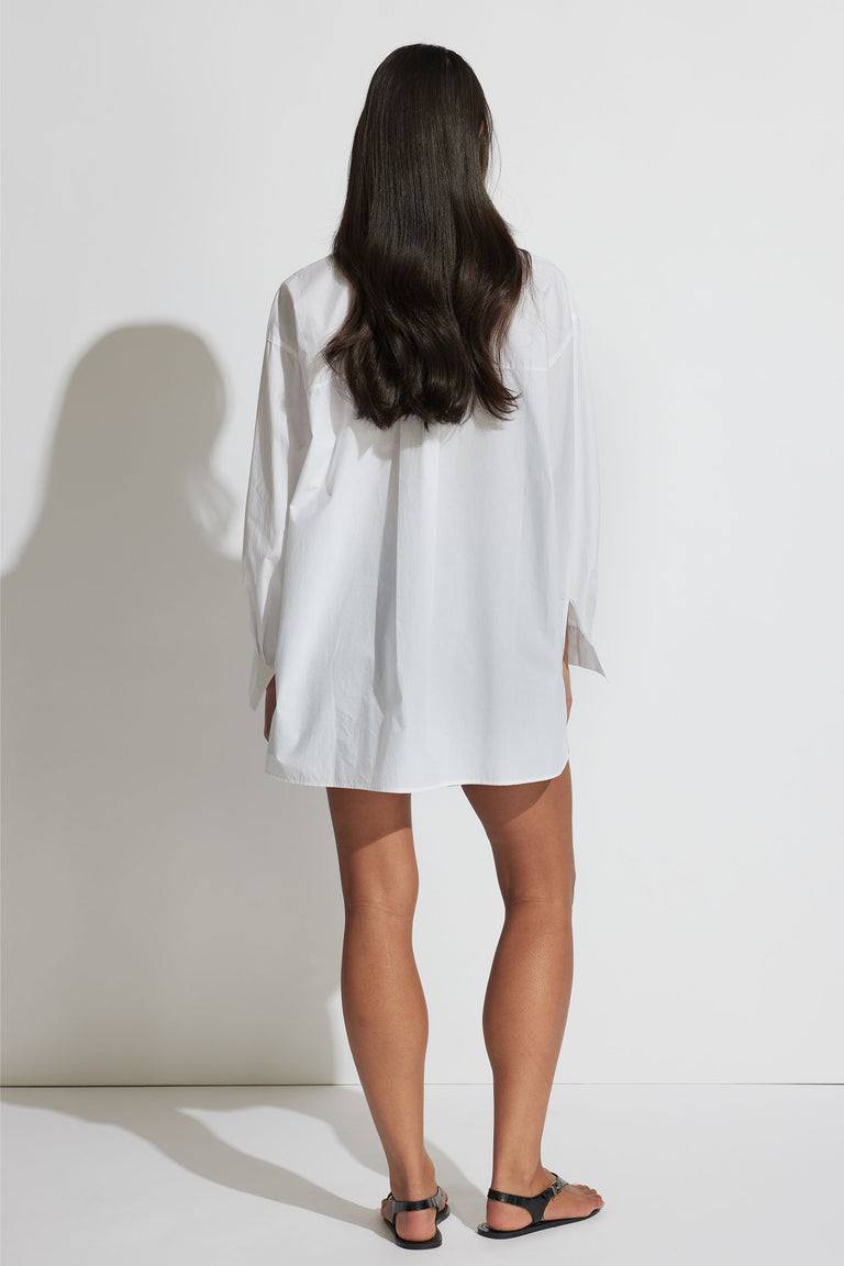 Back view of model in white Ella Oversized Shirt with full sleeves and relaxed fit, gallery position 3 portrait image