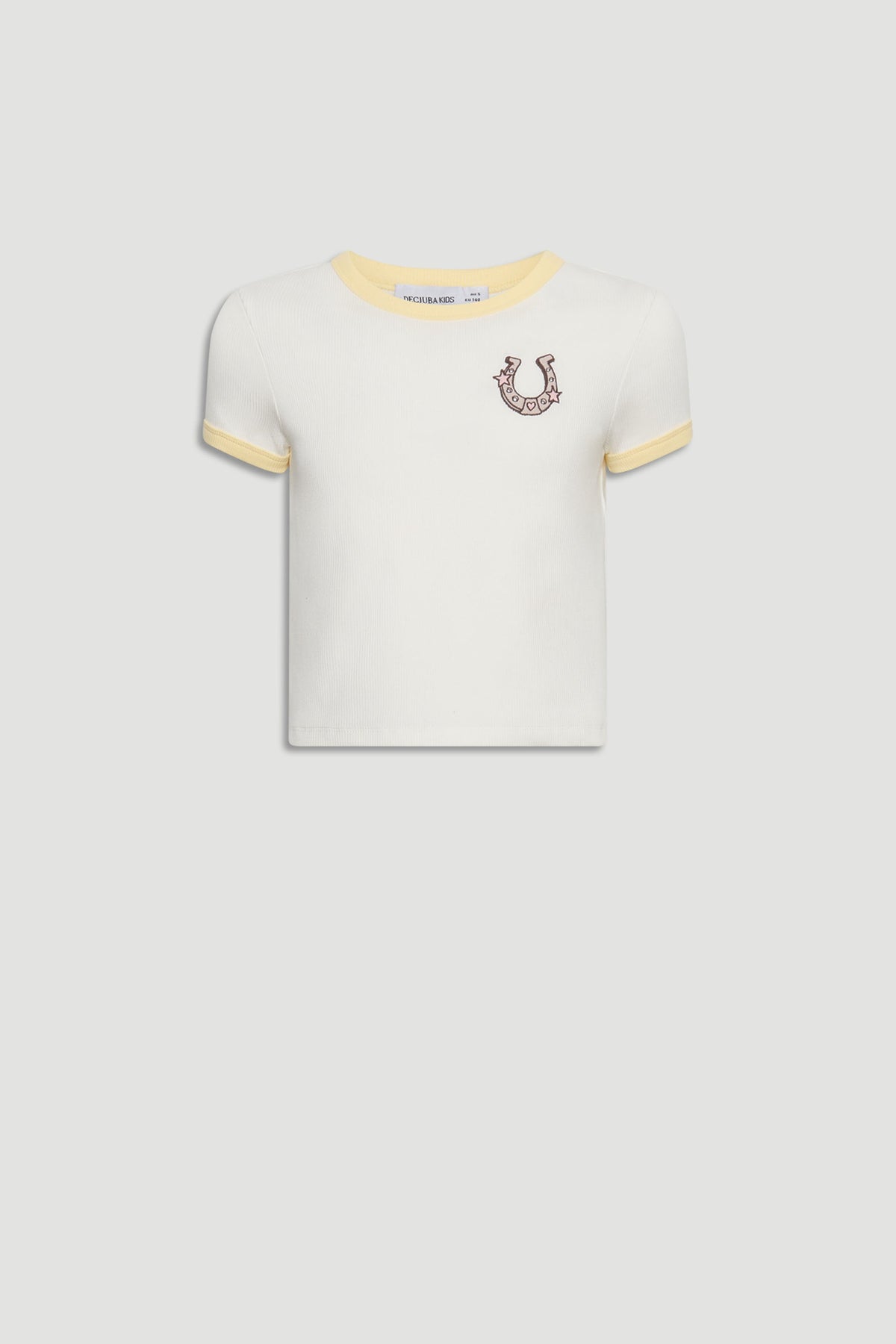 White cropped tee for girls with soft yellow trim and a playful embroidered horseshoe detail on chest