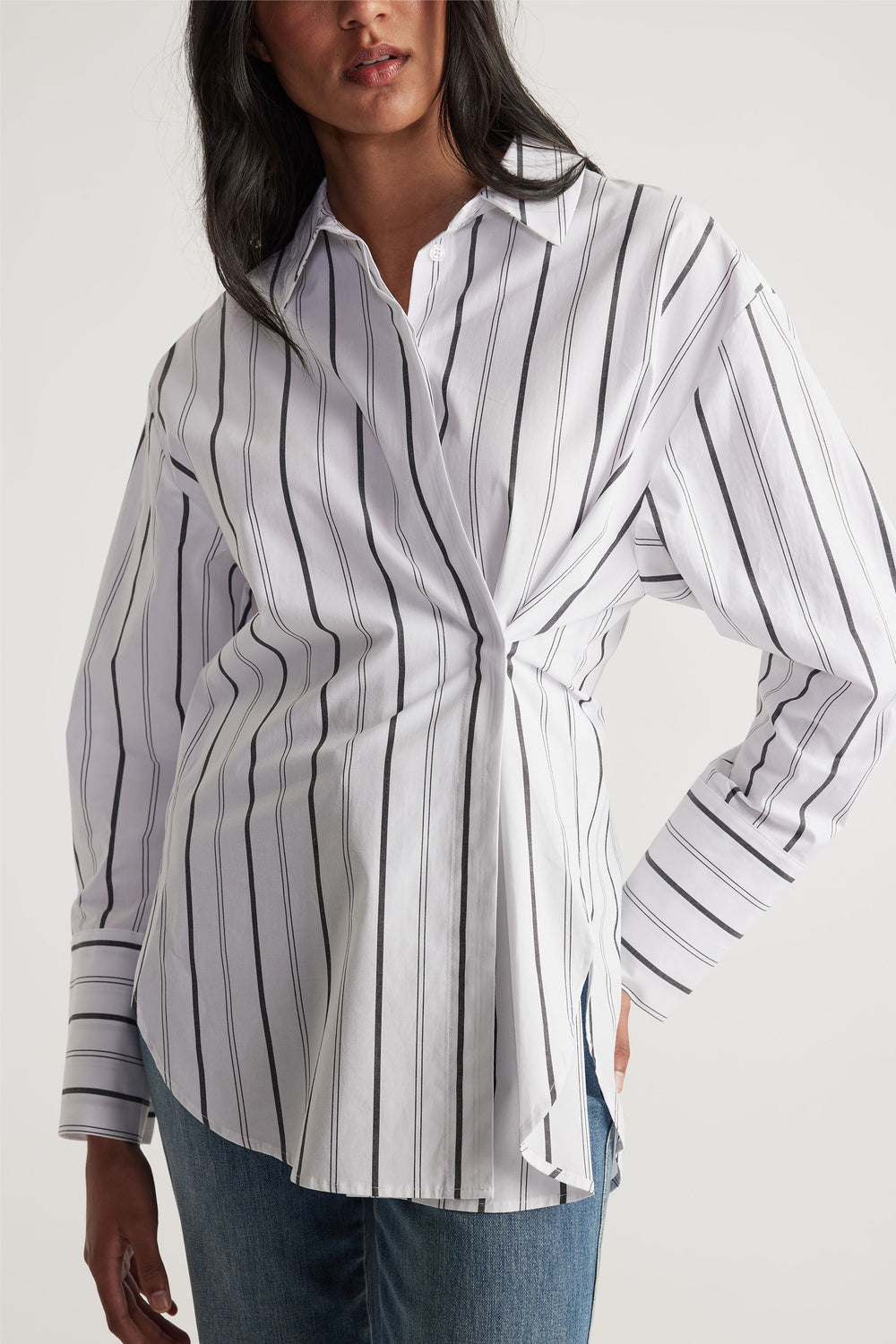 Ivy Button Shirt with vertical stripes, side button detail, and relaxed fit shown in portrait, gallery image 4.