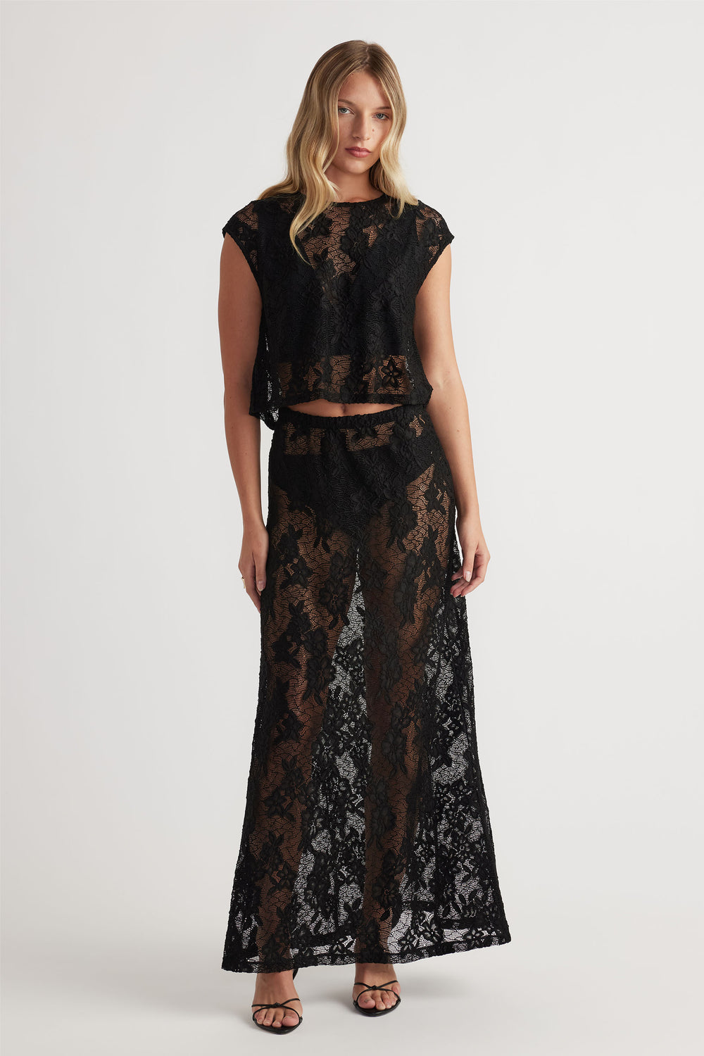 Lace Maxi Skirt in black sheer floral lace with high waist and flowy silhouette by DECJUBA Australian fashion brand