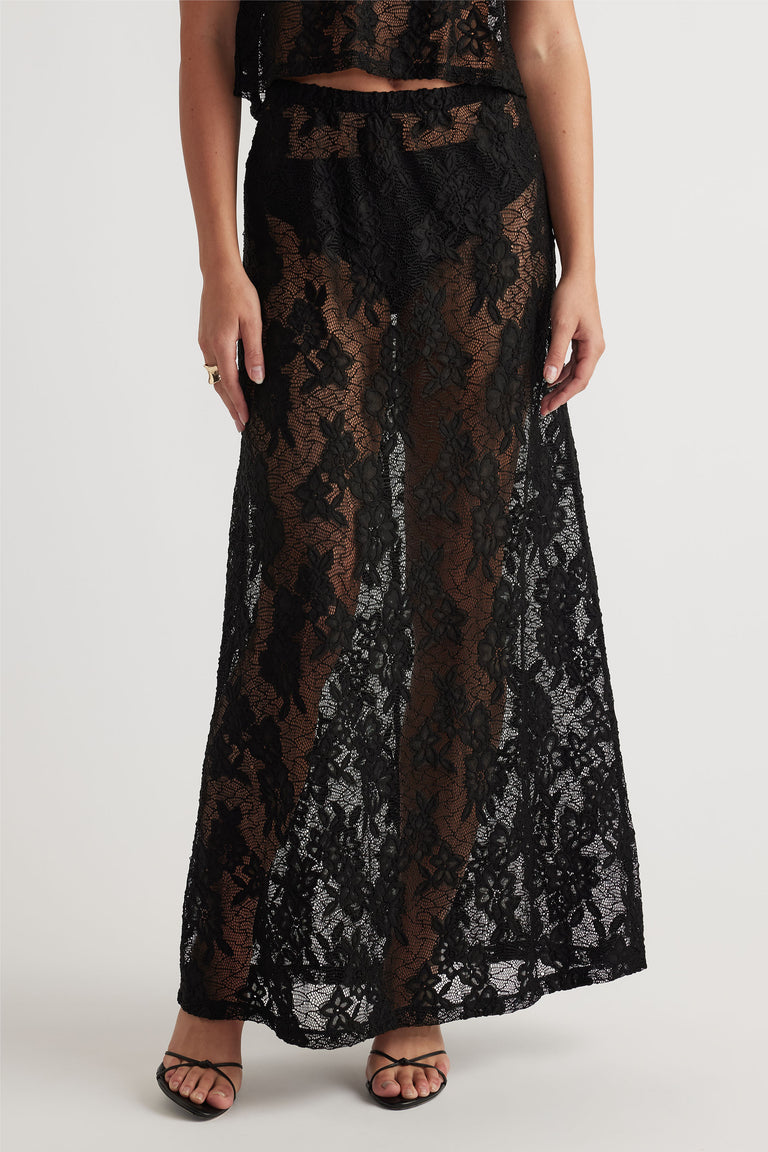 Lace Maxi Skirt in black floral lace with sheer fabric and flowy fit, designed by DECJUBA Australian fashion brand