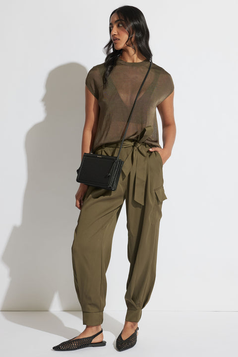 Portrait of model wearing relaxed fit Tatum Knit Tee with short sleeves and crew neck in gallery position 1