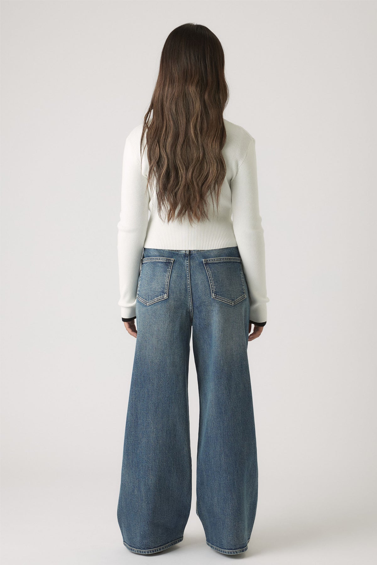 Girls Matilda Zip Up Knit styled with wide-leg classic blue denim jeans, casual and versatile by DECJUBA Australian fashion brand