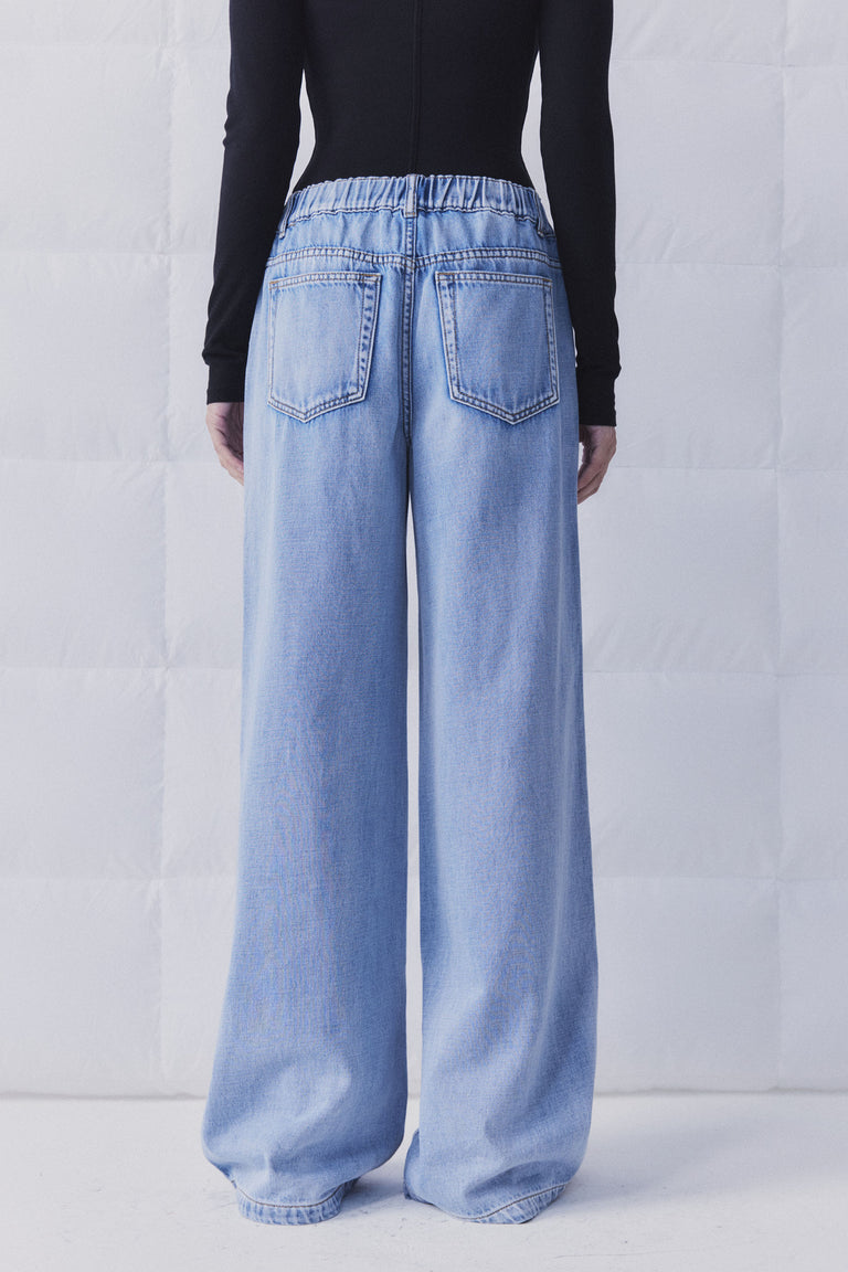 D-Luxe Wide Leg Jean in light denim with elasticated high-rise waist shown from back, gallery position 4 portrait view