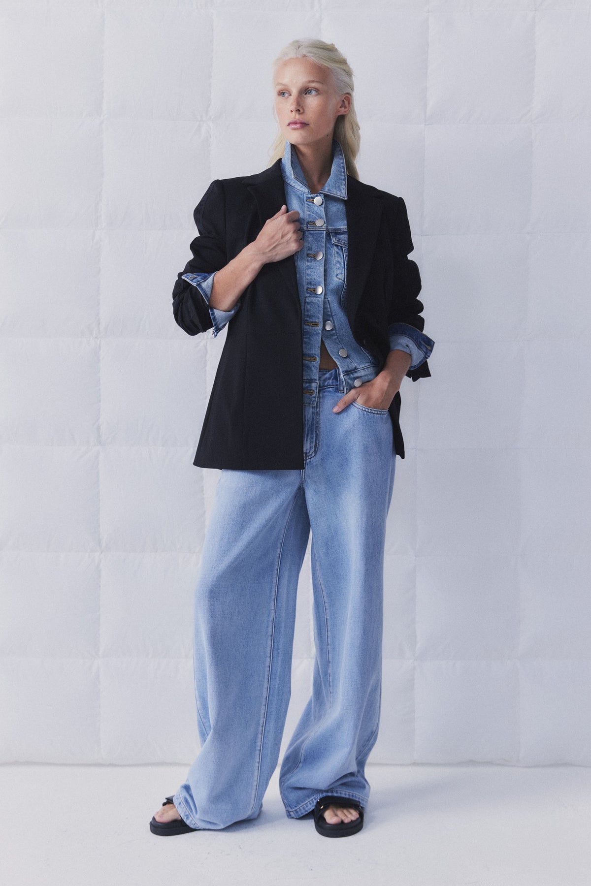 Portrait shot gallery 2 of model wearing D-Luxe Wide Leg Jean with black blazer and denim jacket layering