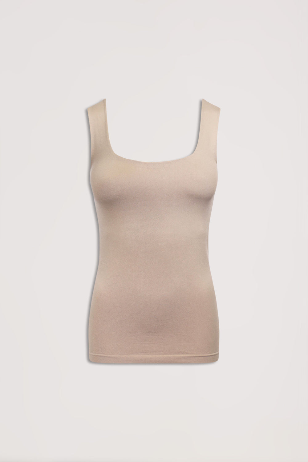 Beige seamless scoop neck tank top with wide straps and a fitted silhouette