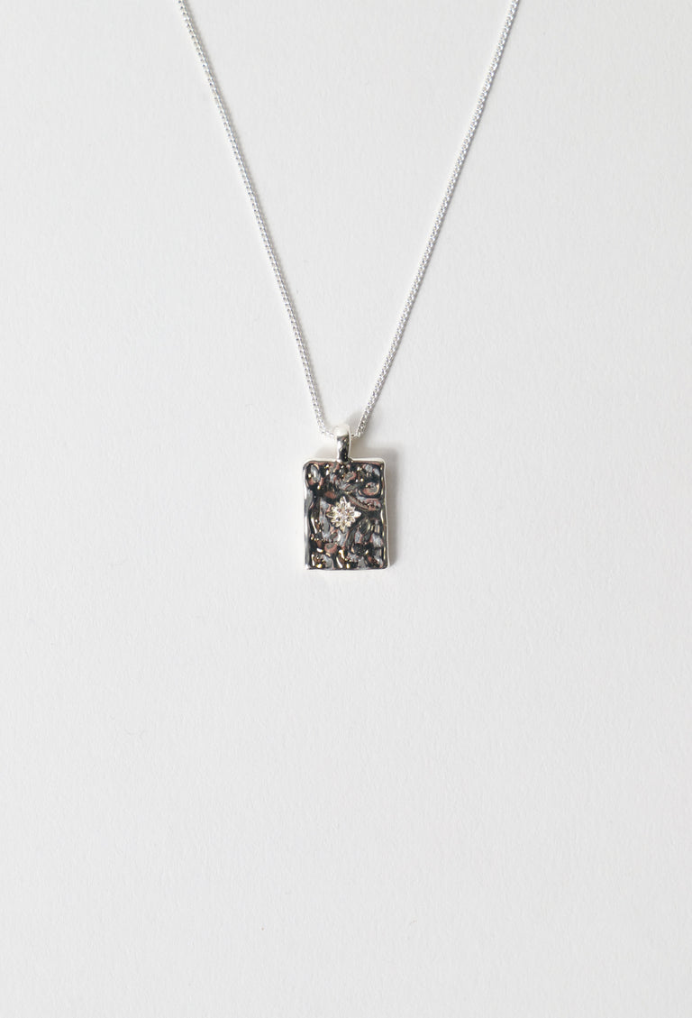 Textured rectangular plate necklace on a fine chain