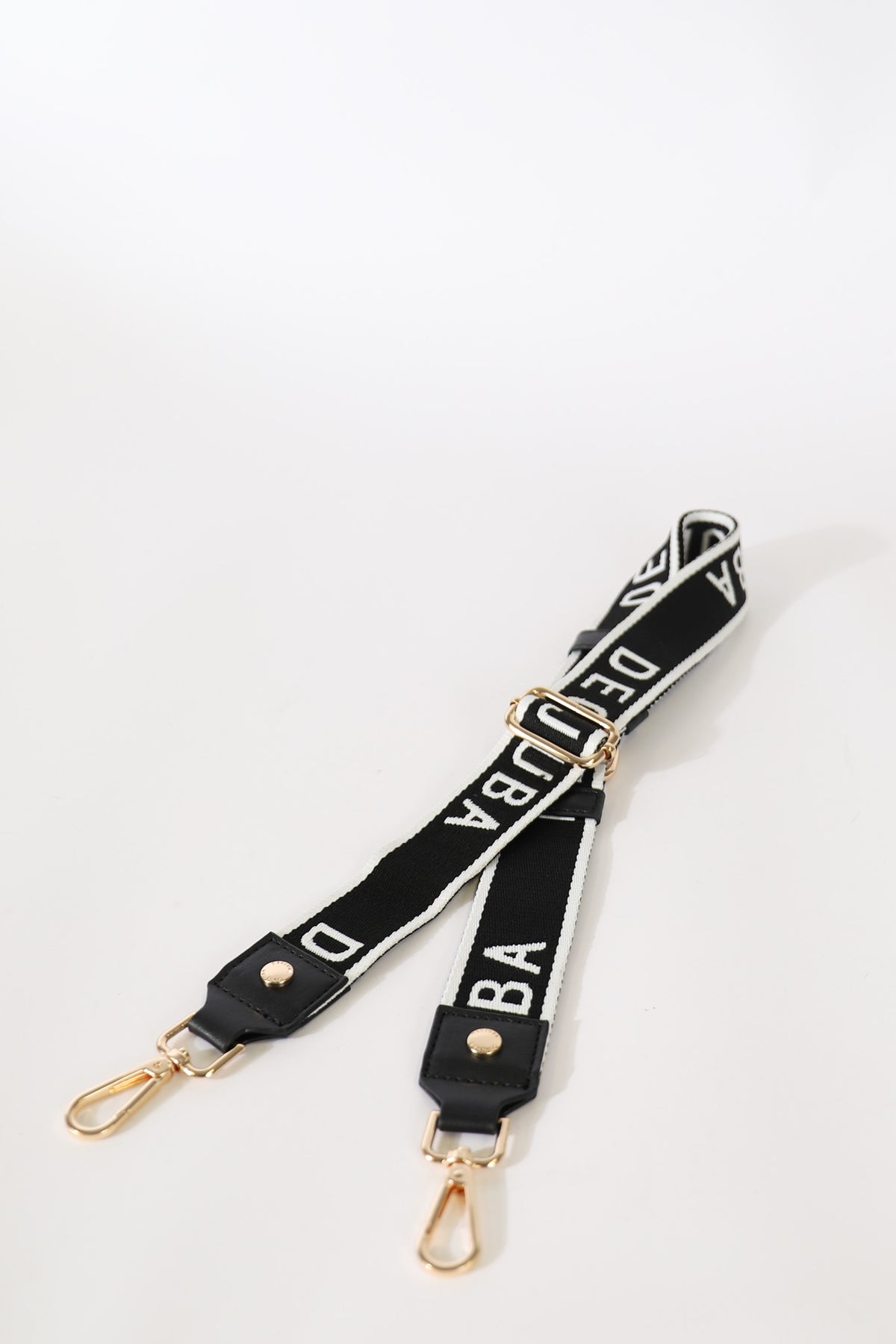 Decjuba Stripe Bag Strap in portrait orientation, gallery position 3, with adjustable buckle and metal lobster claw closures.