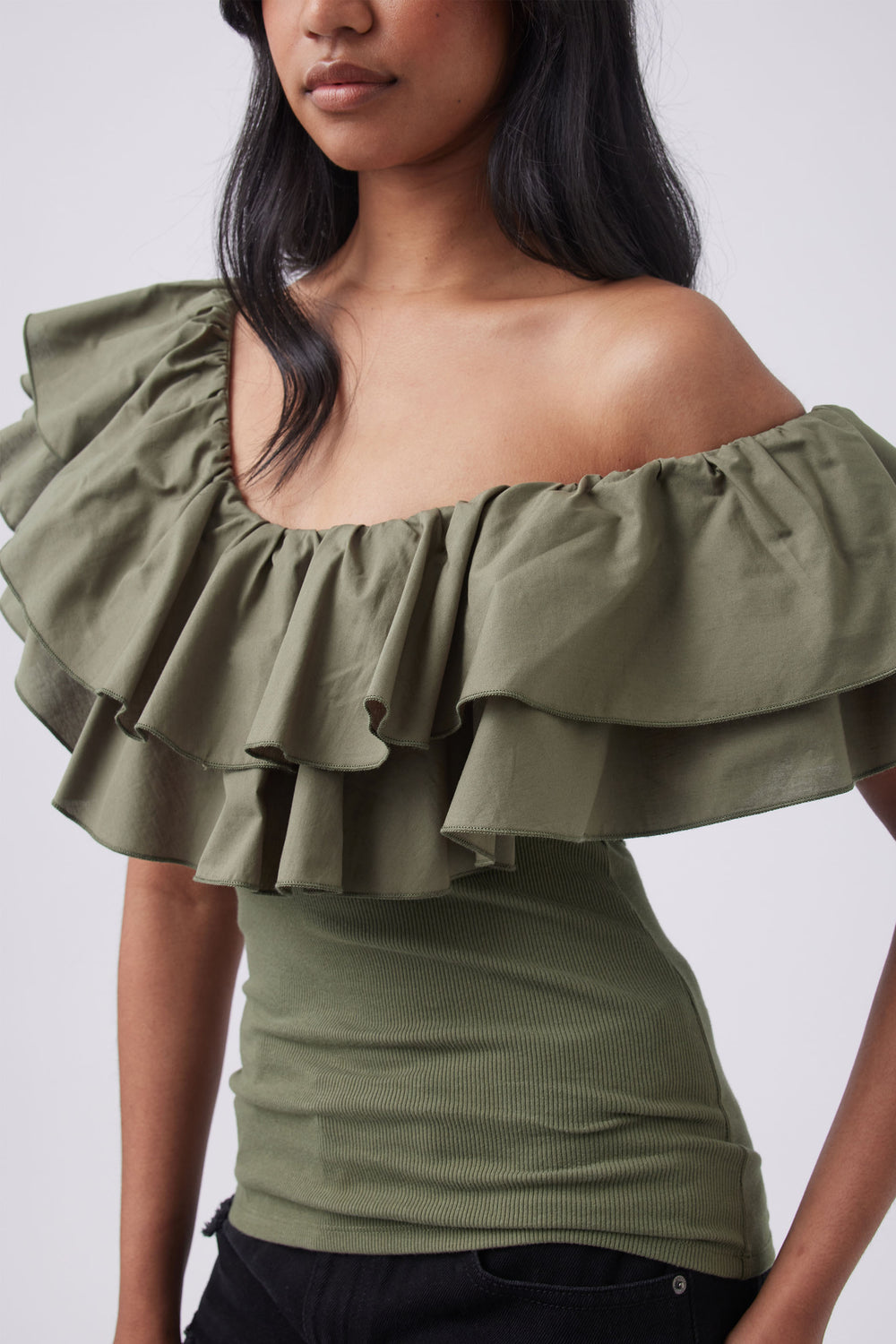 Olive green off shoulder top with layered ruffle neckline and fitted ribbed bodice
