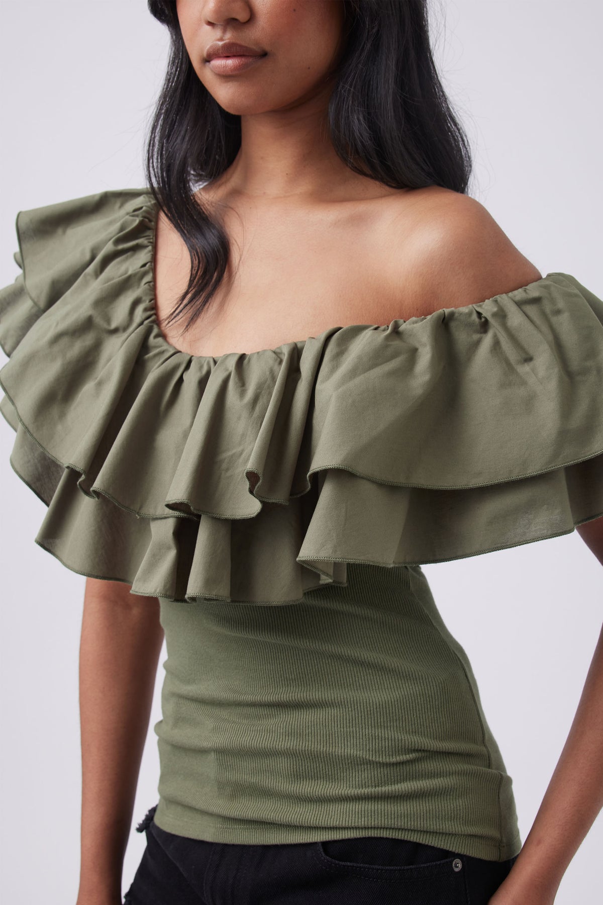 Olive green off shoulder top with layered ruffle neckline and fitted ribbed bodice