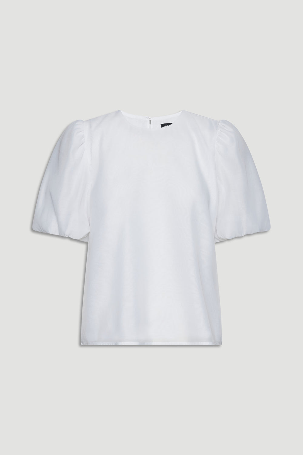 White top with voluminous puff sleeves and a simple round neckline for a chic, effortless look