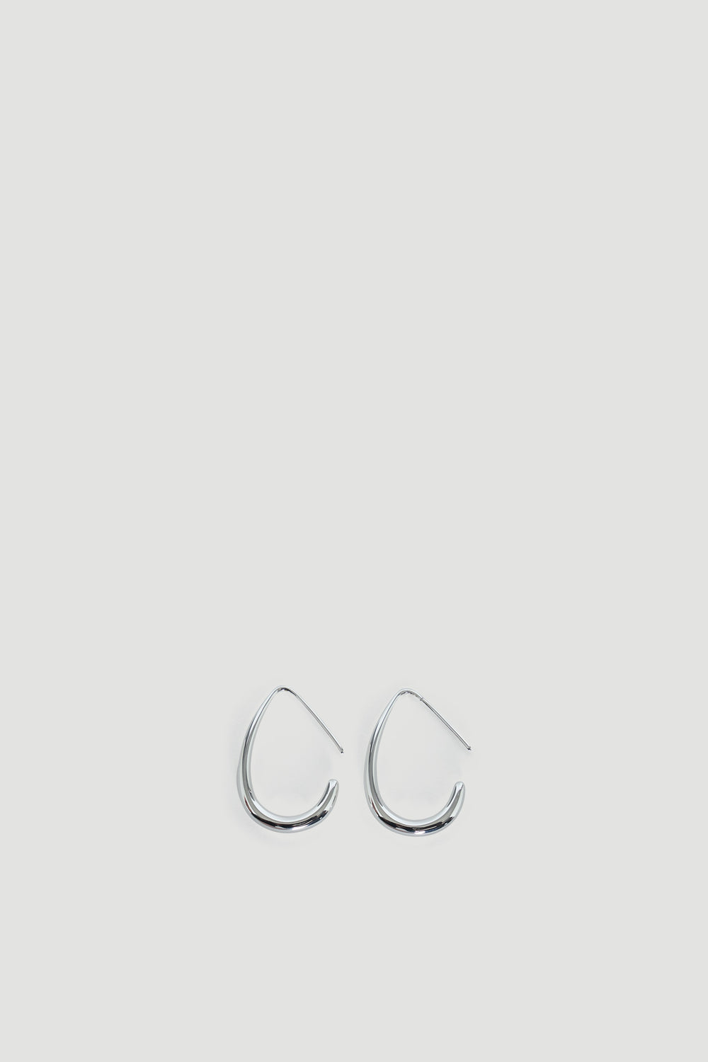 9ct Minimalist Hoop Earrings with irregular teardrop shape, shown in gallery position 1 with portrait orientation.