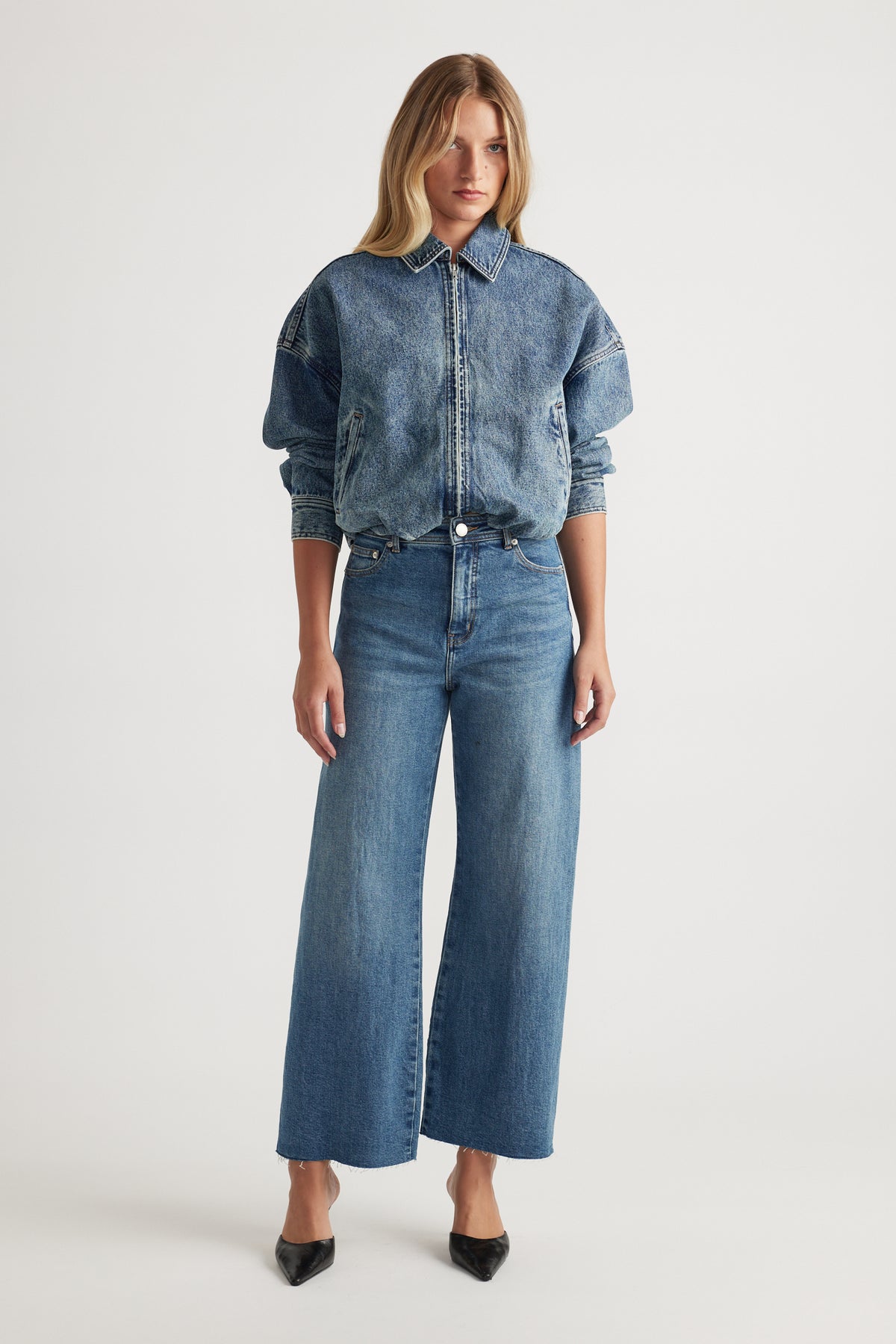 Tahni Wide Leg Jean in classic mid blue denim with high waist and relaxed fit, styled by Decjuba for everyday wear