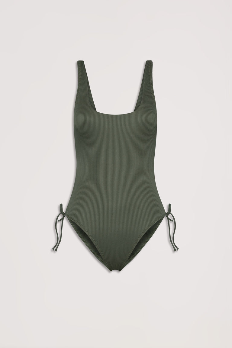 Soft olive ribbed one-piece swimsuit with scoop neckline and adjustable side drawcords, laid flat on a neutral background