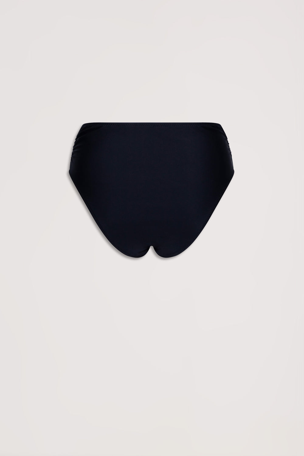 Black matte bikini bottom with subtle gathered sides, shown flat against a neutral background for a sleek look