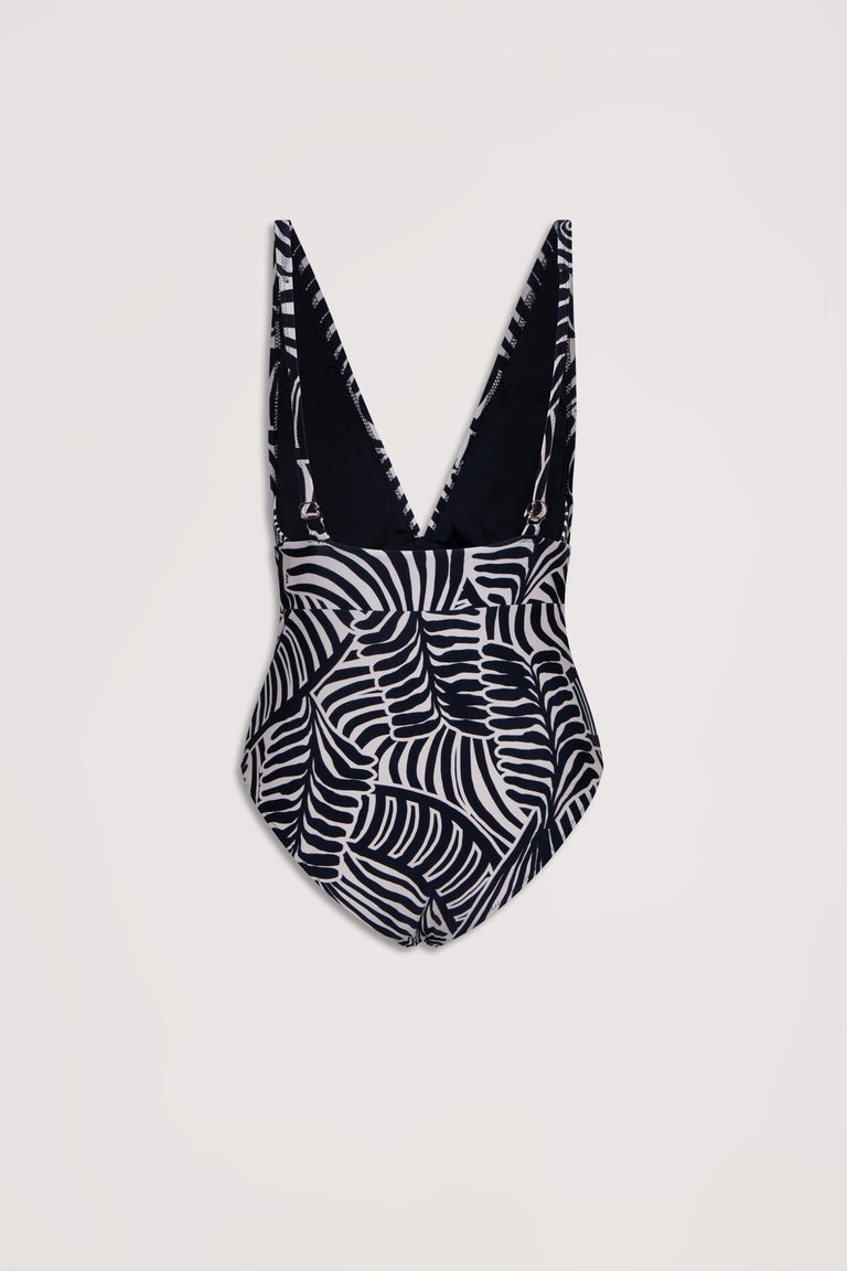 Black and white tropical leaf print one-piece swimsuit with a deep V back and adjustable shoulder straps