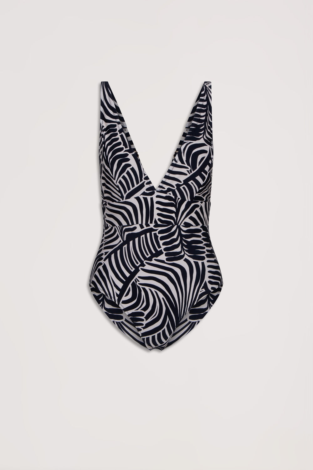 One-piece swimsuit with deep V neckline featuring a bold black and white tropical leaf matte print