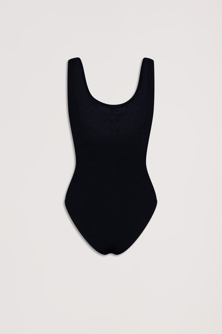Black crinkle textured one-piece swimsuit with a scoop neckline, styled for a sleek, timeless silhouette.