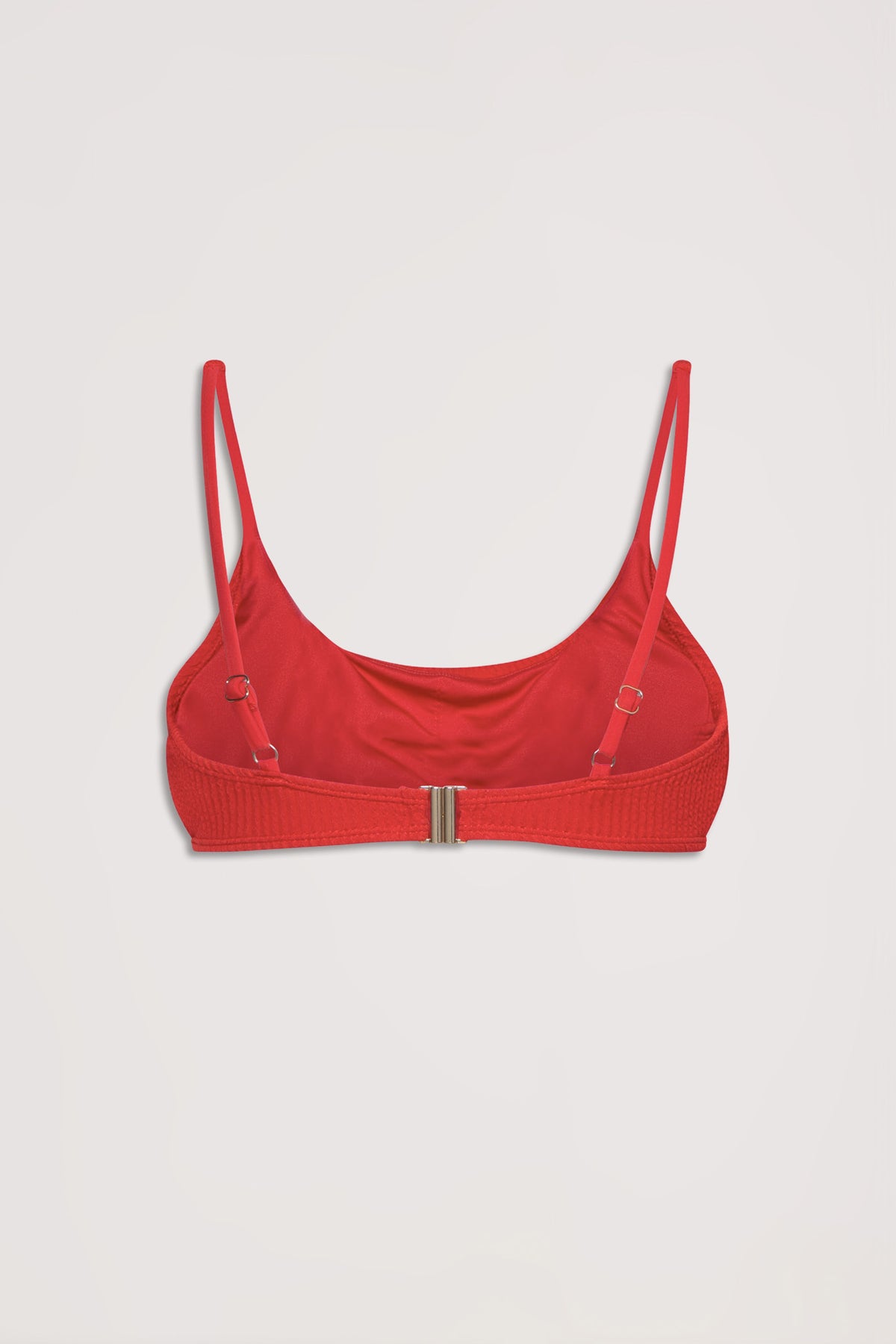 Back view of a vibrant red crinkle bikini top with adjustable straps and metal clasp closure