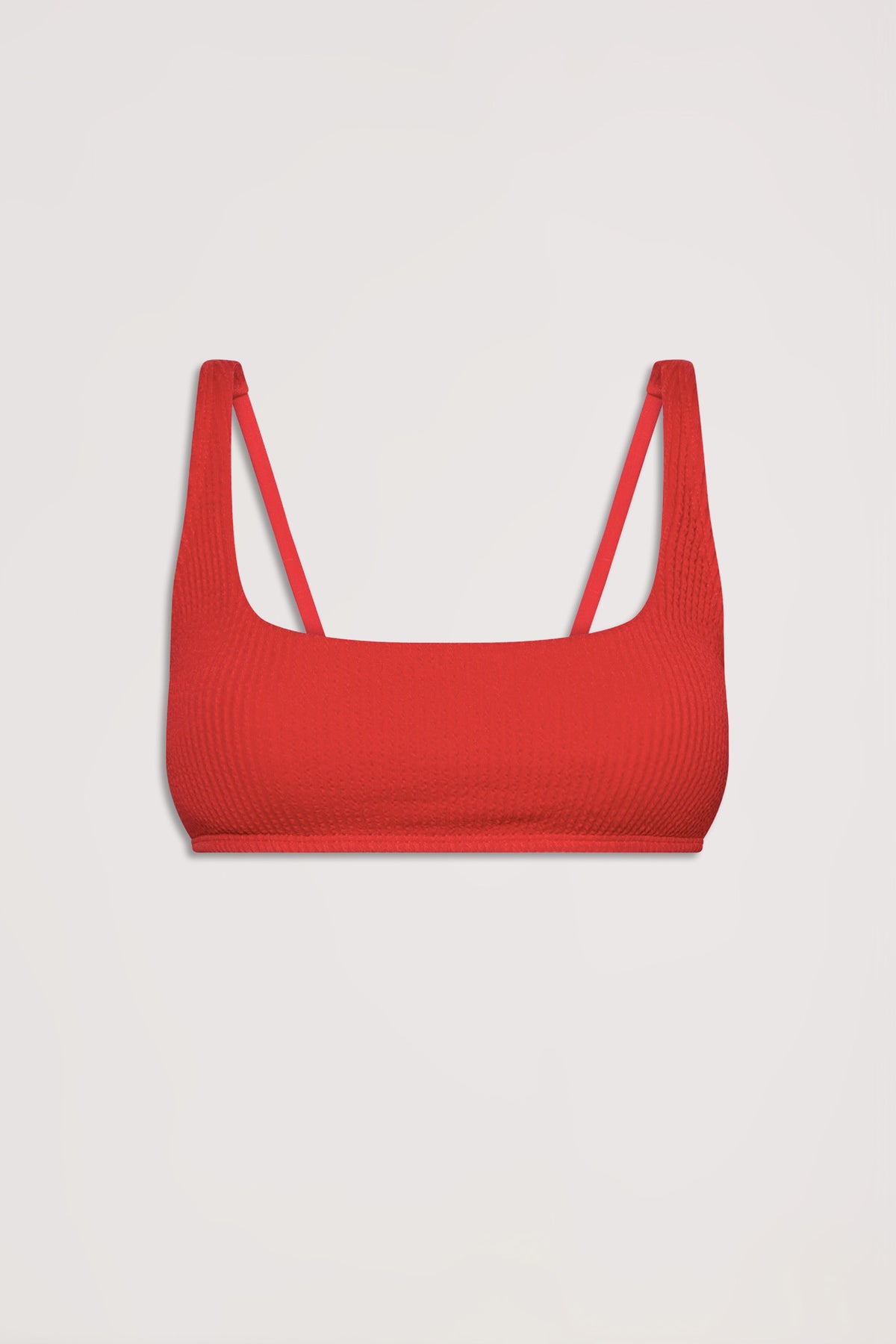 Red crinkle textured bikini top with thin shoulder straps displayed against a light background