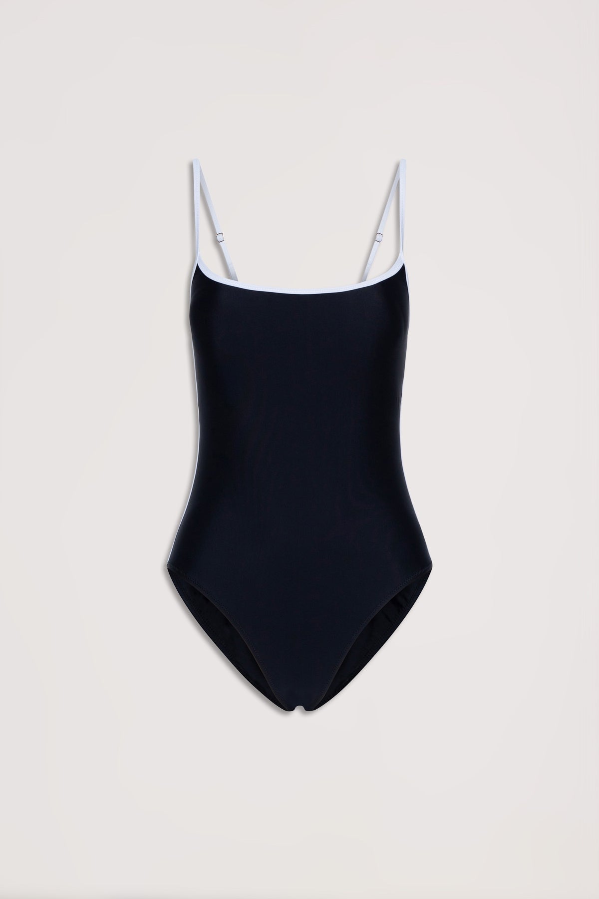 Black one-piece swimsuit with white contrast trim and adjustable thin straps on a neutral background