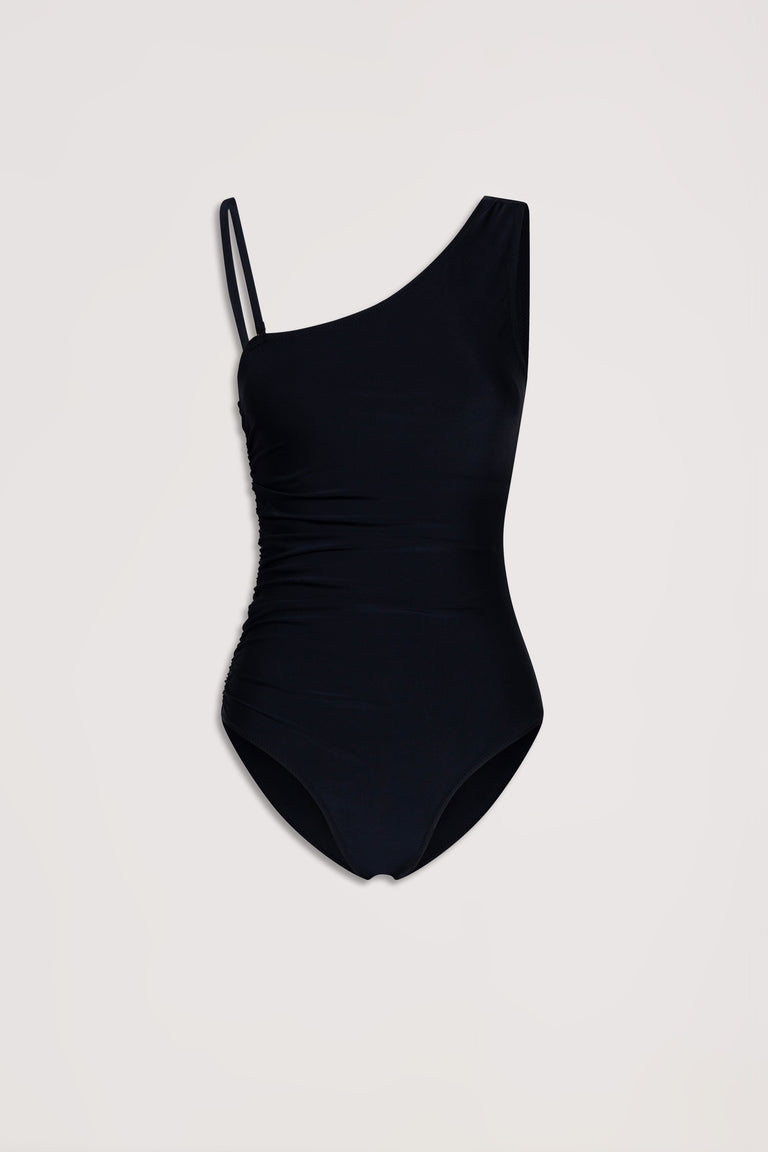 Black matte one-piece swimsuit with an asymmetrical one-shoulder design and subtle ruched sides