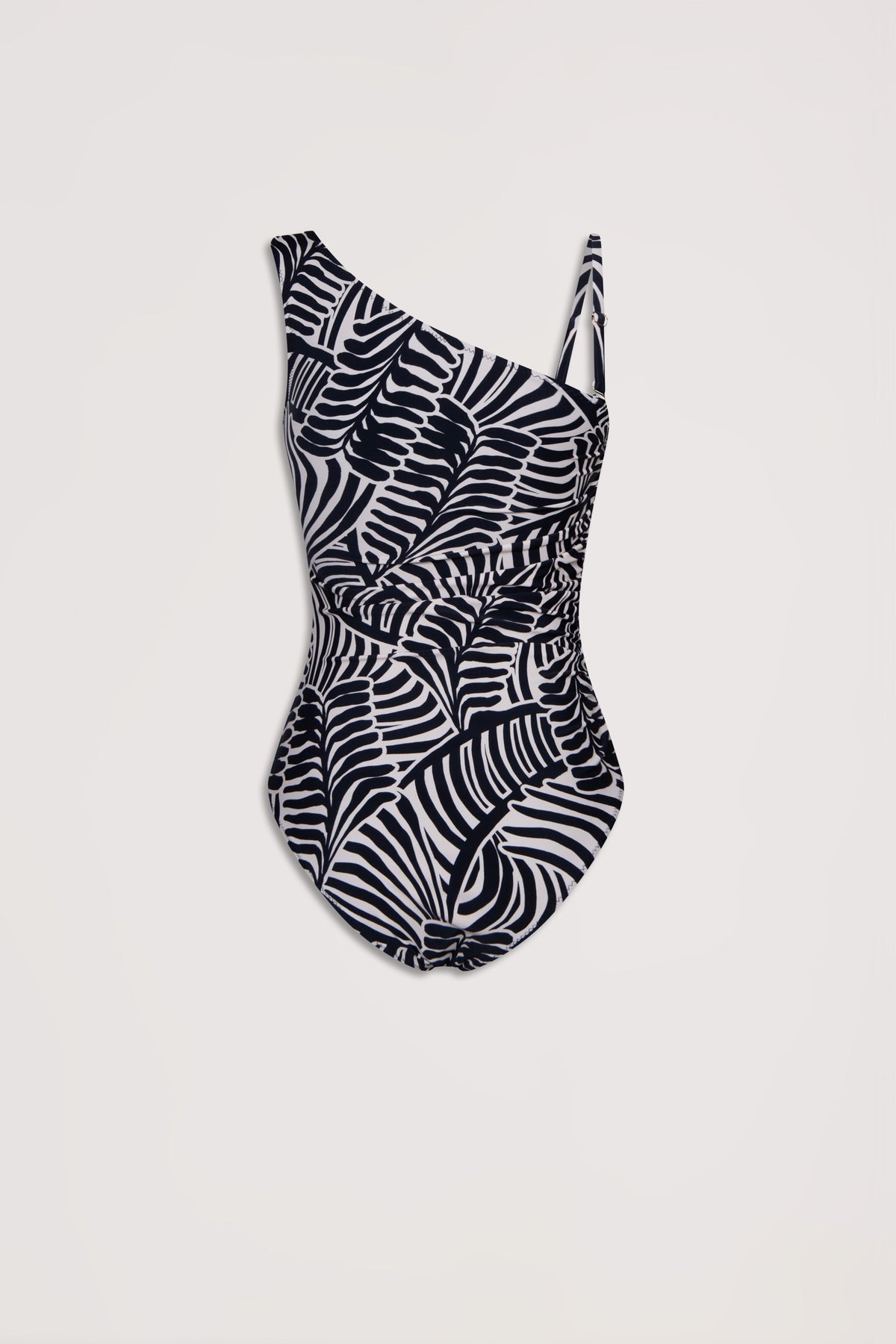 Black and white matte one-shoulder swimsuit with an abstract palm leaf pattern and subtle ruching detail