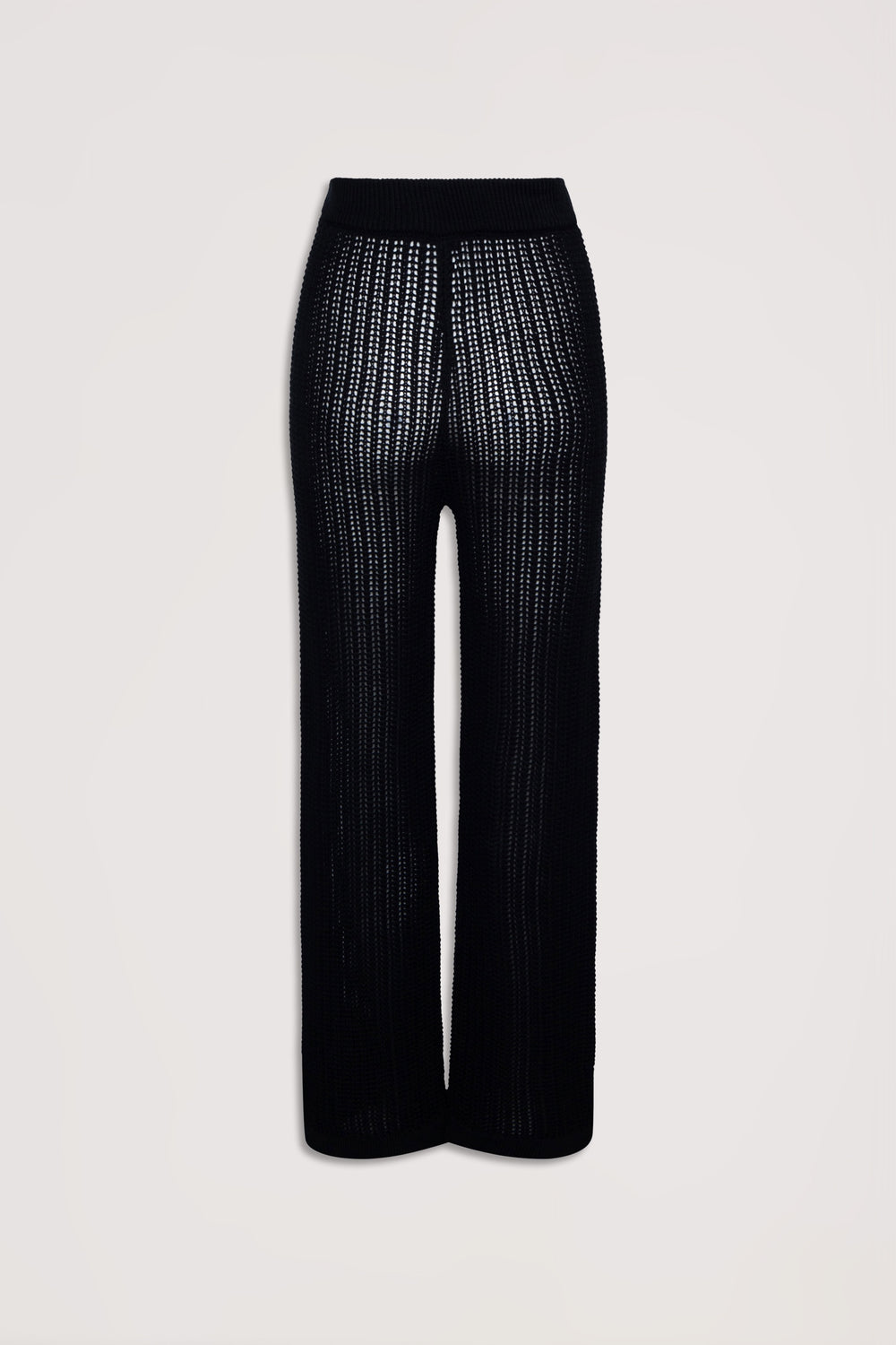 Black crochet pants with a relaxed fit and textured open knit design, styled for effortless everyday wear.