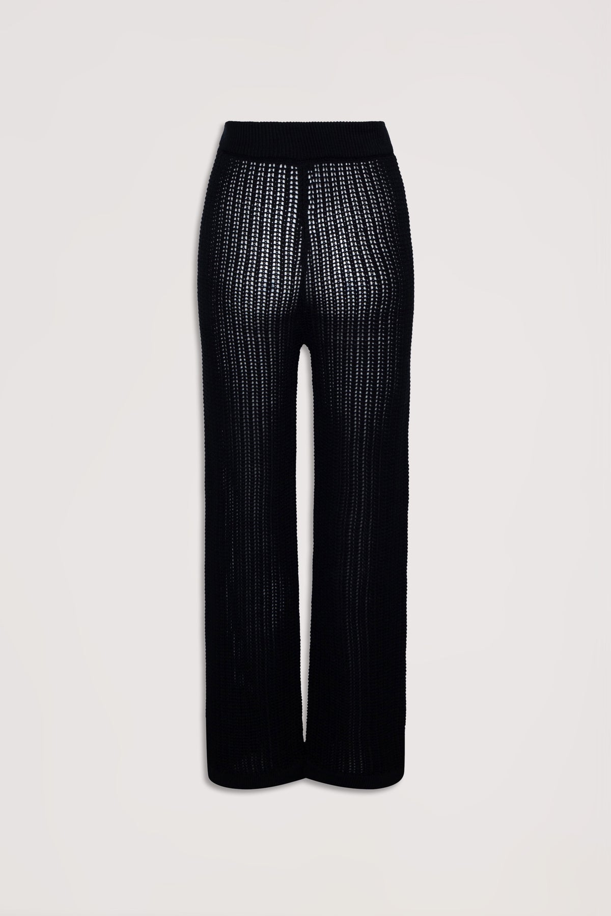 Black crochet pants with a relaxed fit and textured open knit design, styled for effortless everyday wear.