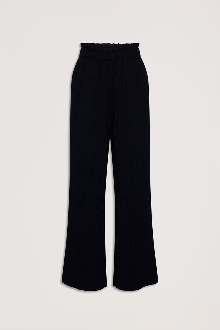 Black wide-leg pants with a gathered paperbag waist and relaxed fit, perfect for everyday effortless style.