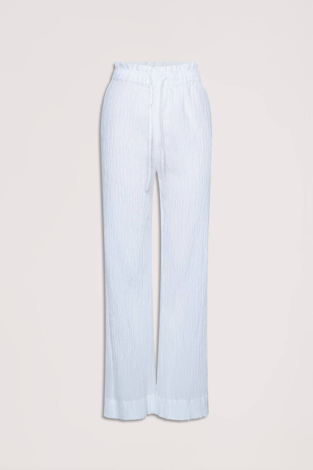 White textured lightweight pants with an elastic drawstring waistband, designed for relaxed everyday comfort.