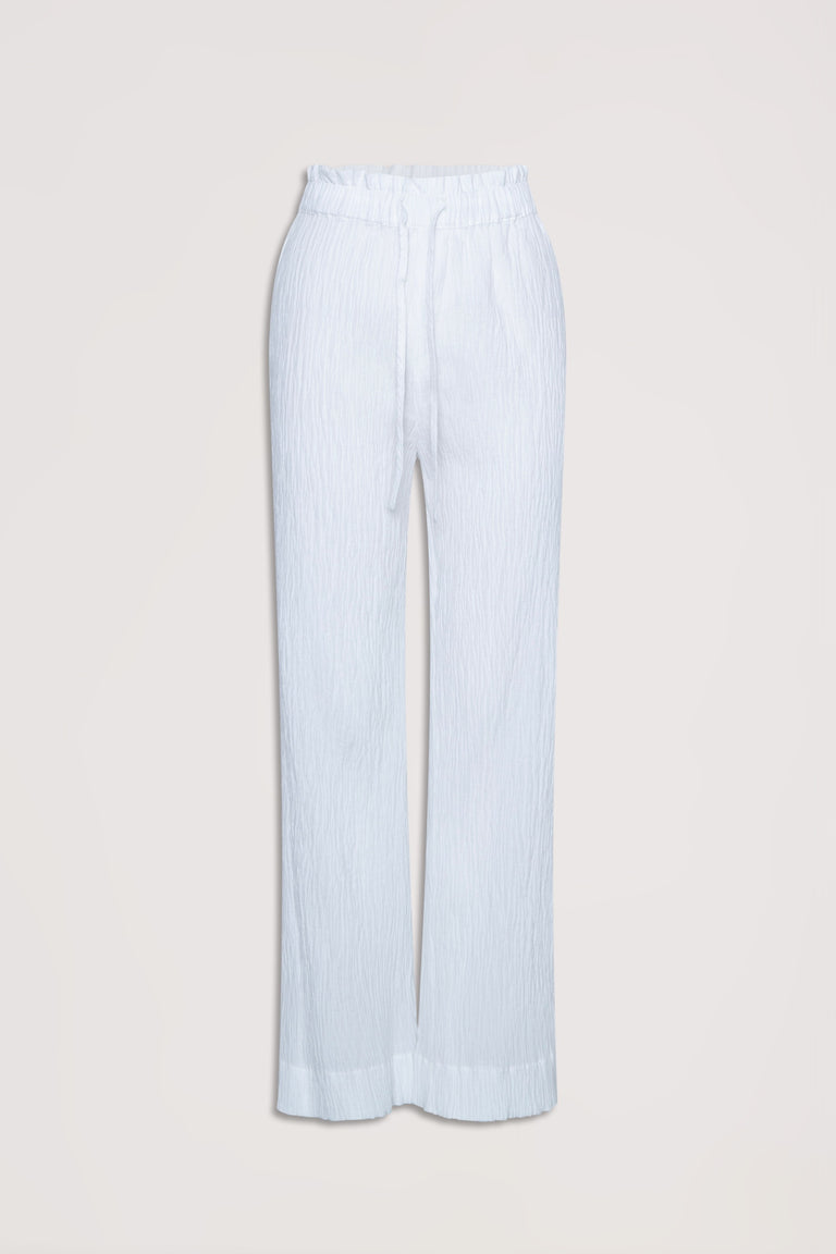 White textured lightweight pants with an elastic drawstring waistband, designed for relaxed everyday comfort.