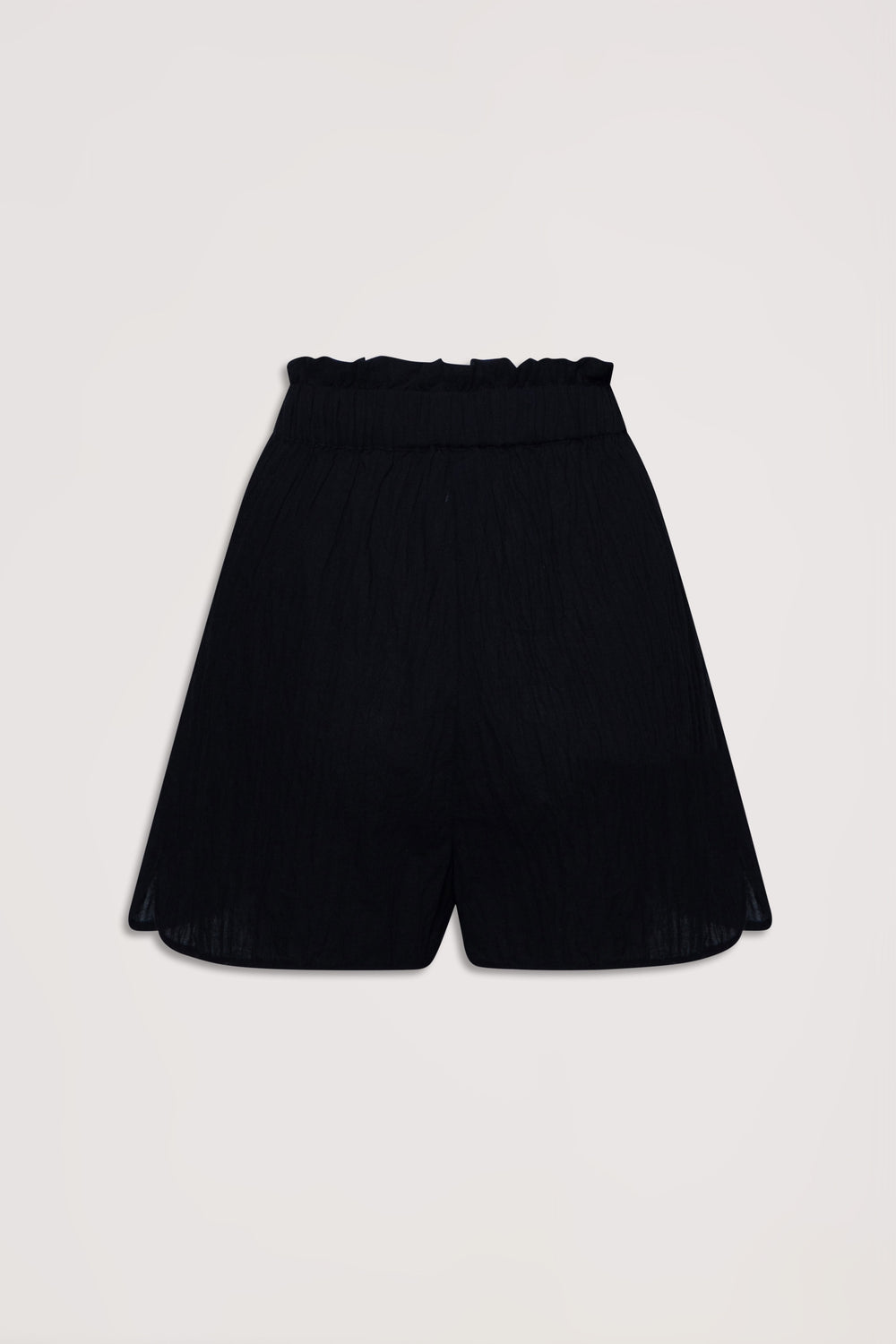 Black lightweight beach shorts featuring a gathered elastic waist and relaxed, flowy silhouette for effortless comfort.