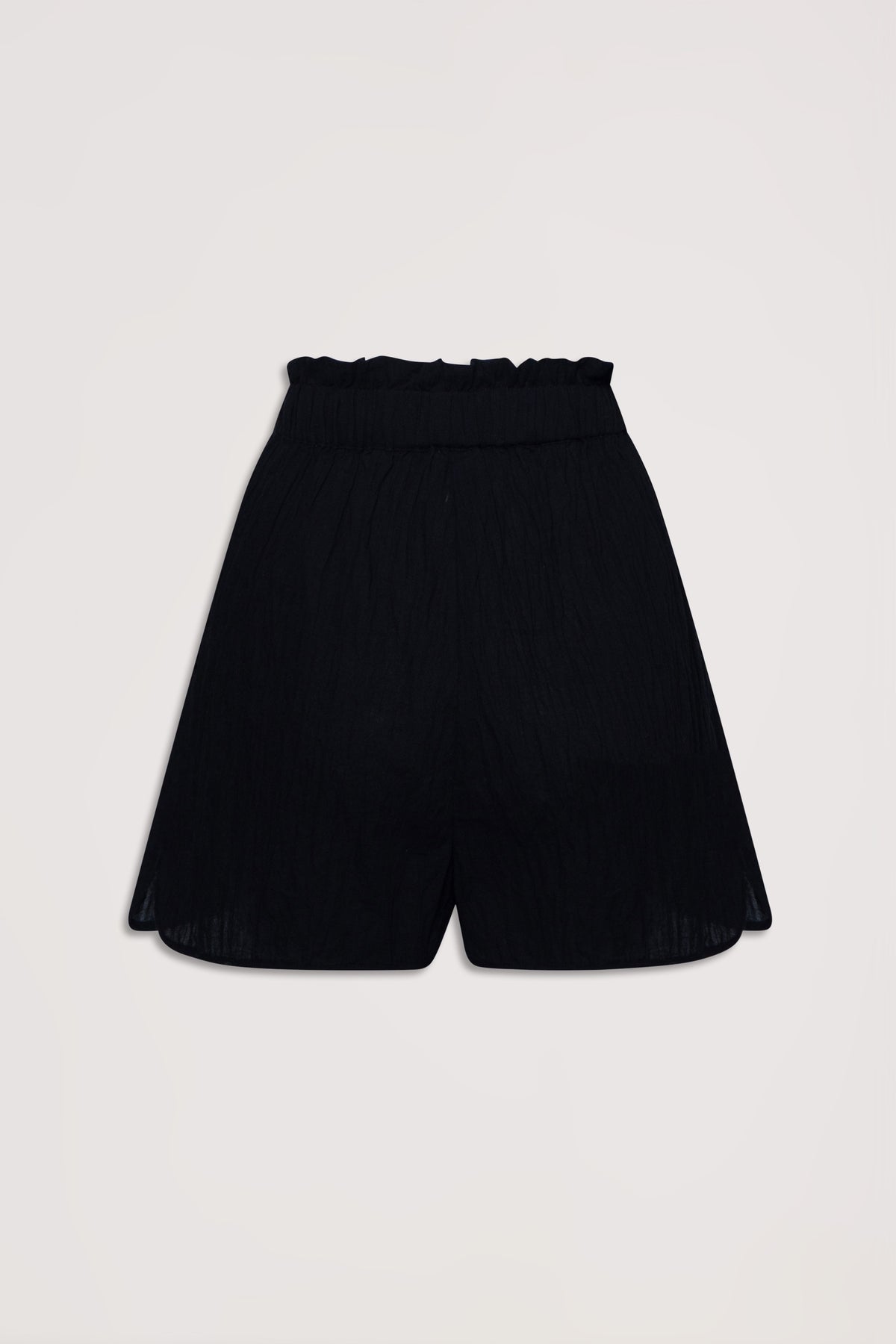 Black lightweight beach shorts featuring a gathered elastic waist and relaxed, flowy silhouette for effortless comfort.