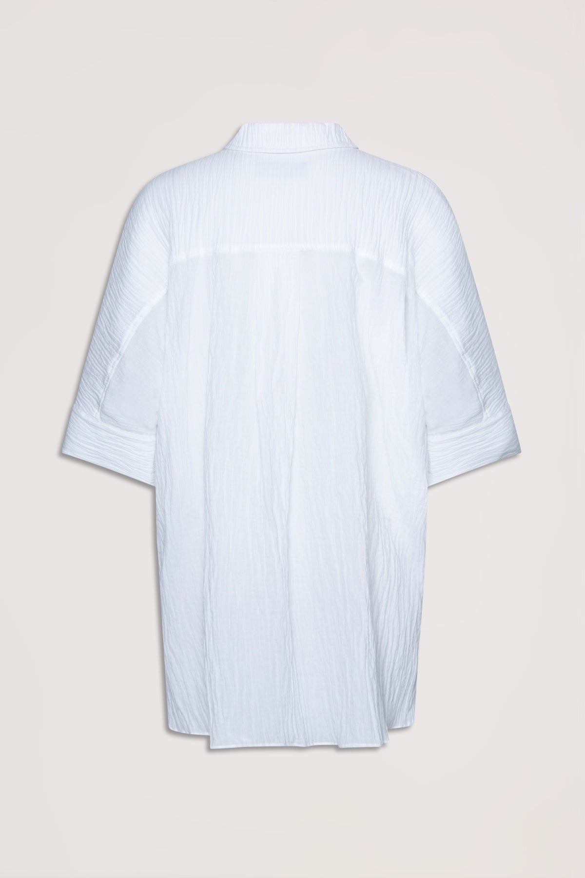 Back view of a relaxed fit white beach shirt with subtle textured stripes and mid-length sleeves