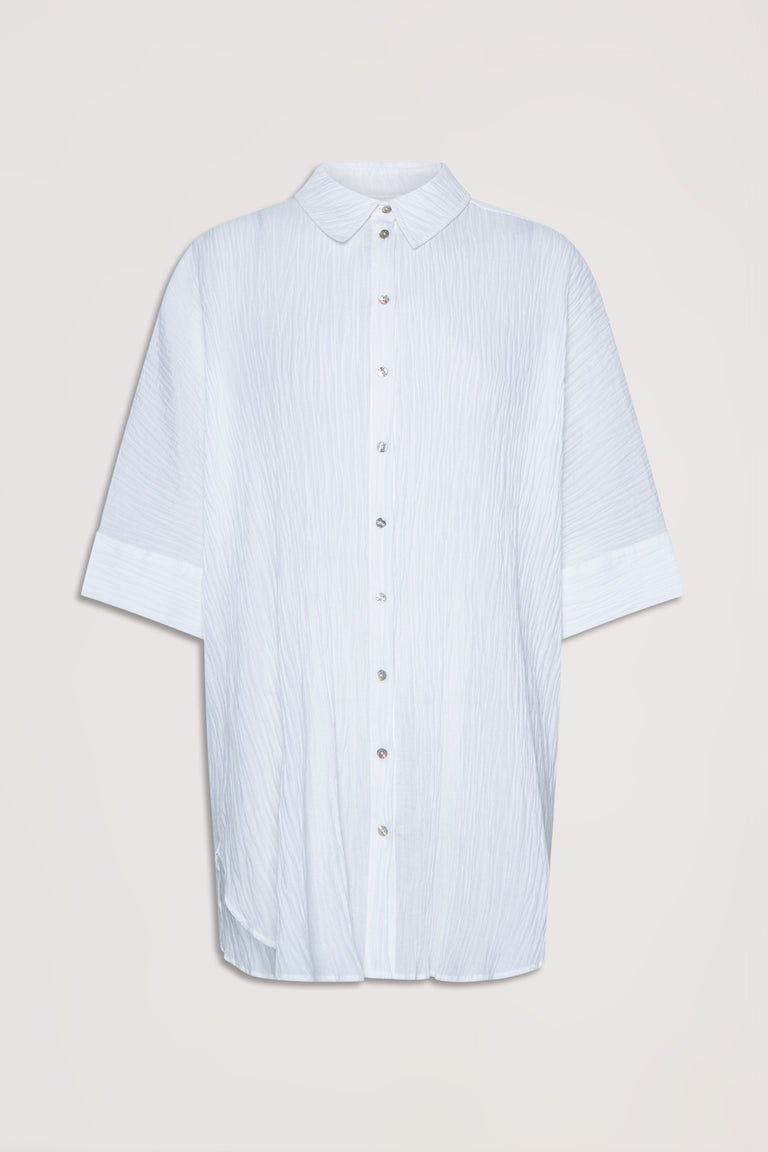 White textured button-up beach shirt with a relaxed fit and short sleeves, featuring a classic collar design