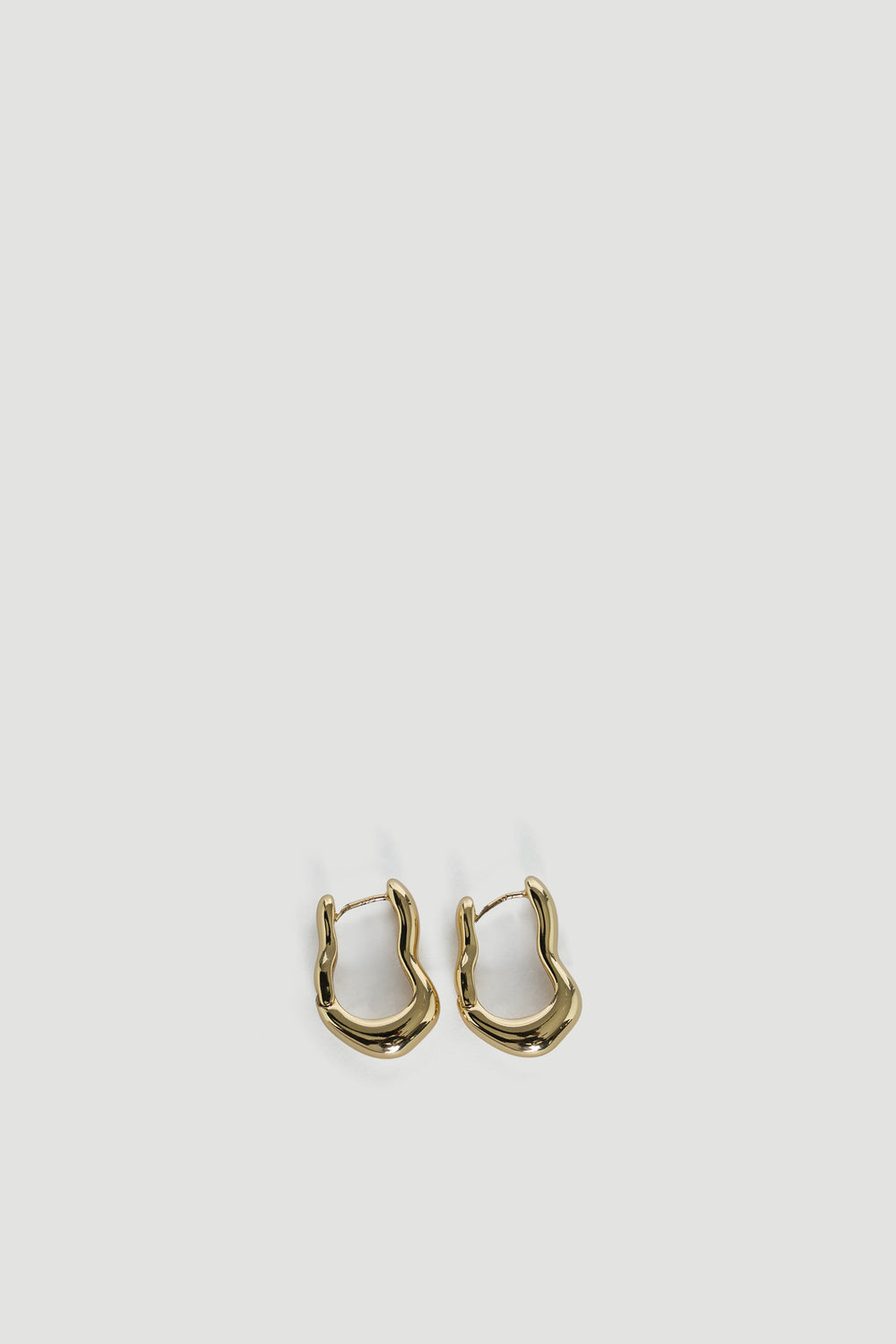 9ct Wavy Hoop Earrings in polished gold tone by DECJUBA, an Australian brand for effortless versatile style.